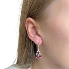 Fascinating 3.26ct Rubies and Diamonds Dangling Earrings in 18k White Gold - IGI