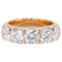 Fascinante bague à 5 pierres avec trois diamants taille idéale de 4,51 carats