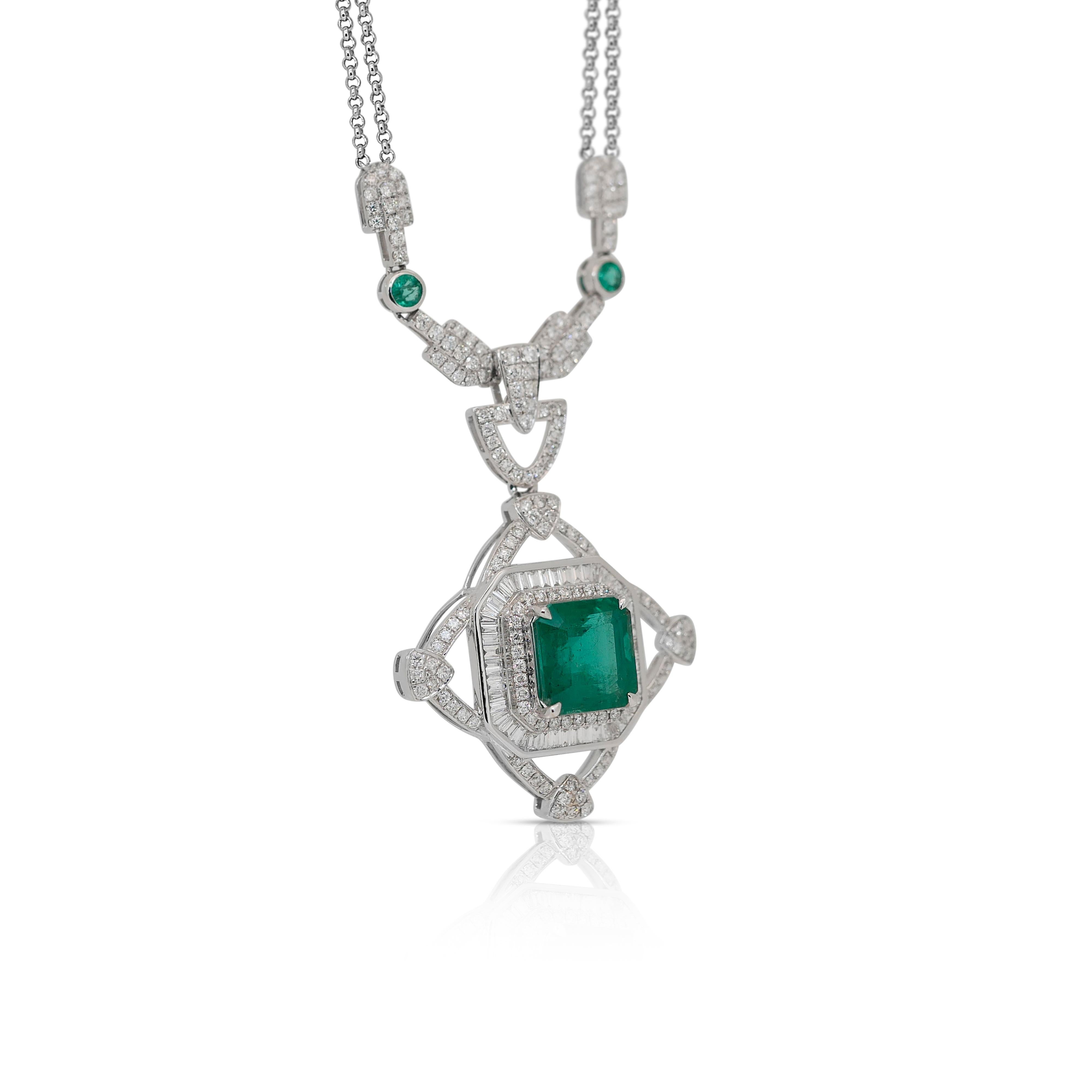 Fascinating 8.02ct Emeralds and Diamonds Necklace with Pendant in 14k White Gold - IGI Certified

This luxurious 14k white gold necklace showcases a captivating 4.35-carat step-cut emerald as the centerpiece, radiating vibrant green hues.