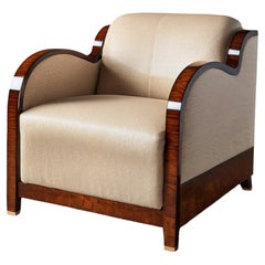 Fascinating Art Deco armchair with mahogany veneer