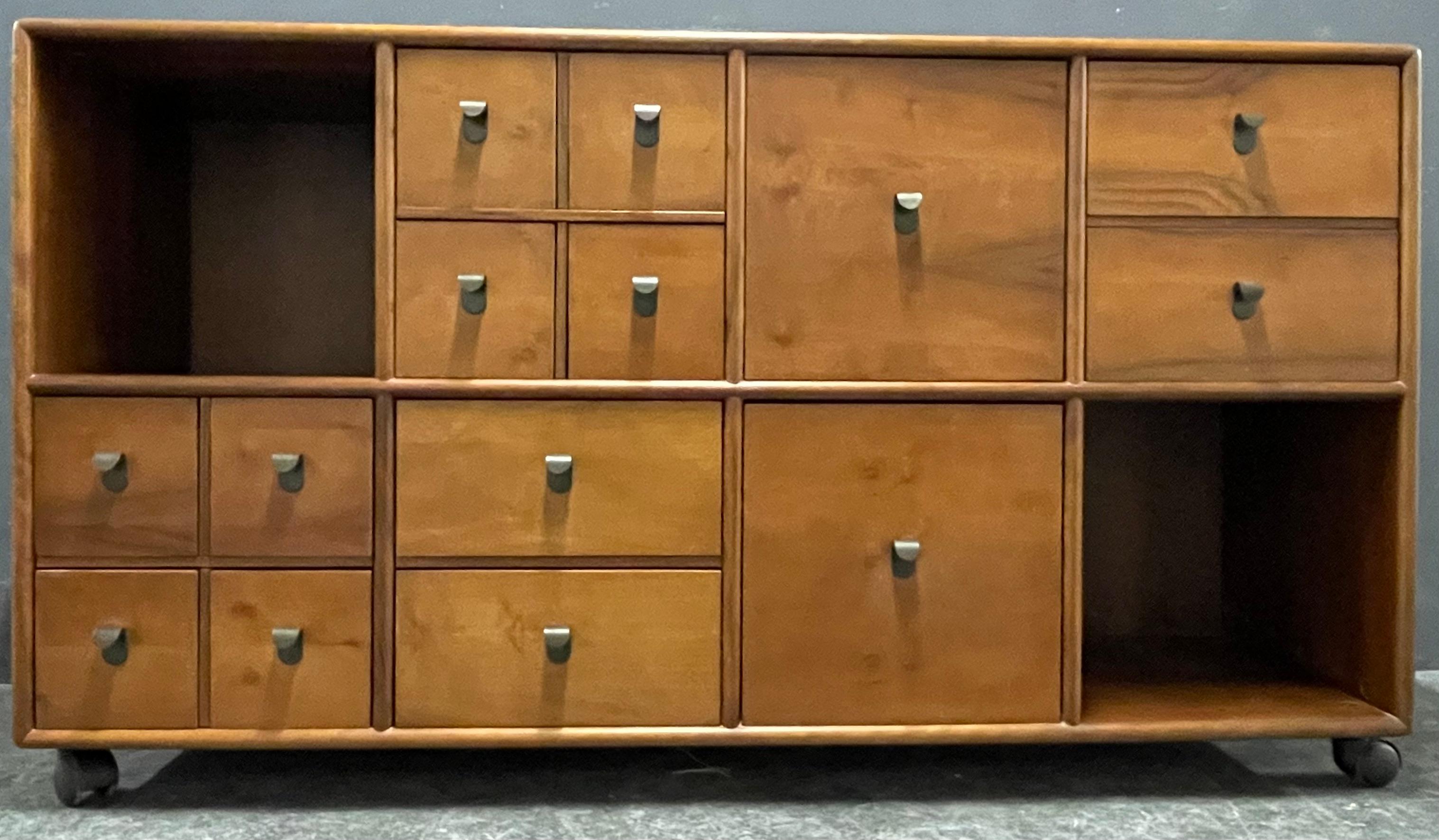 Absolute amazing side - or highboard by the masters of transformation design - the famous italien company bernini. drawers can be changed in position and the wheels can also be changed. so the board can be used as high - or sideboard. also it has a