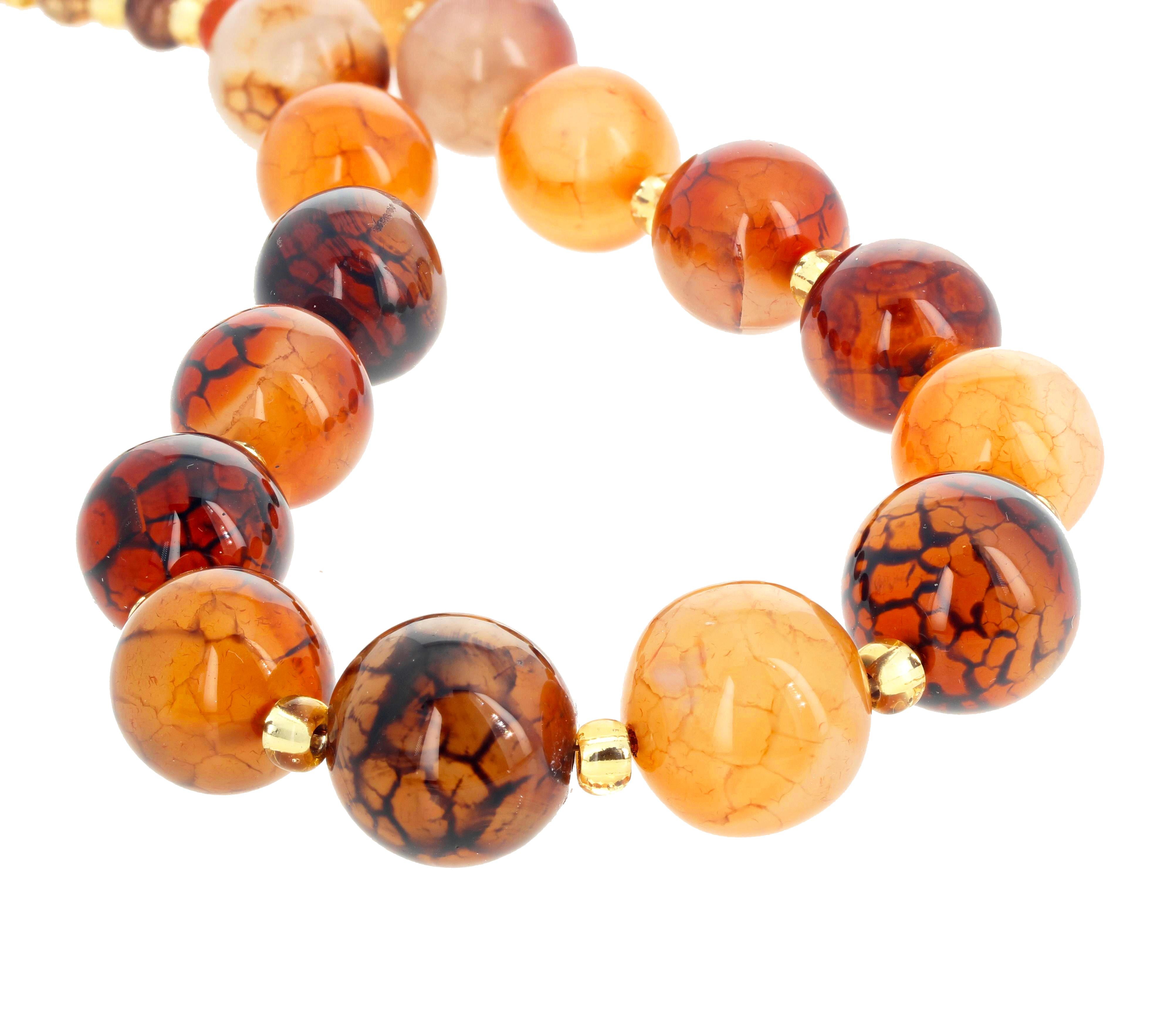 Gorgeous translucent glowing unique Spider Web Jasper (largest 20 mm) enhanced with brilliant glowing bright gold crystals set in this lovely 19 inch long necklace with gold tone hook easy to use clasp. 