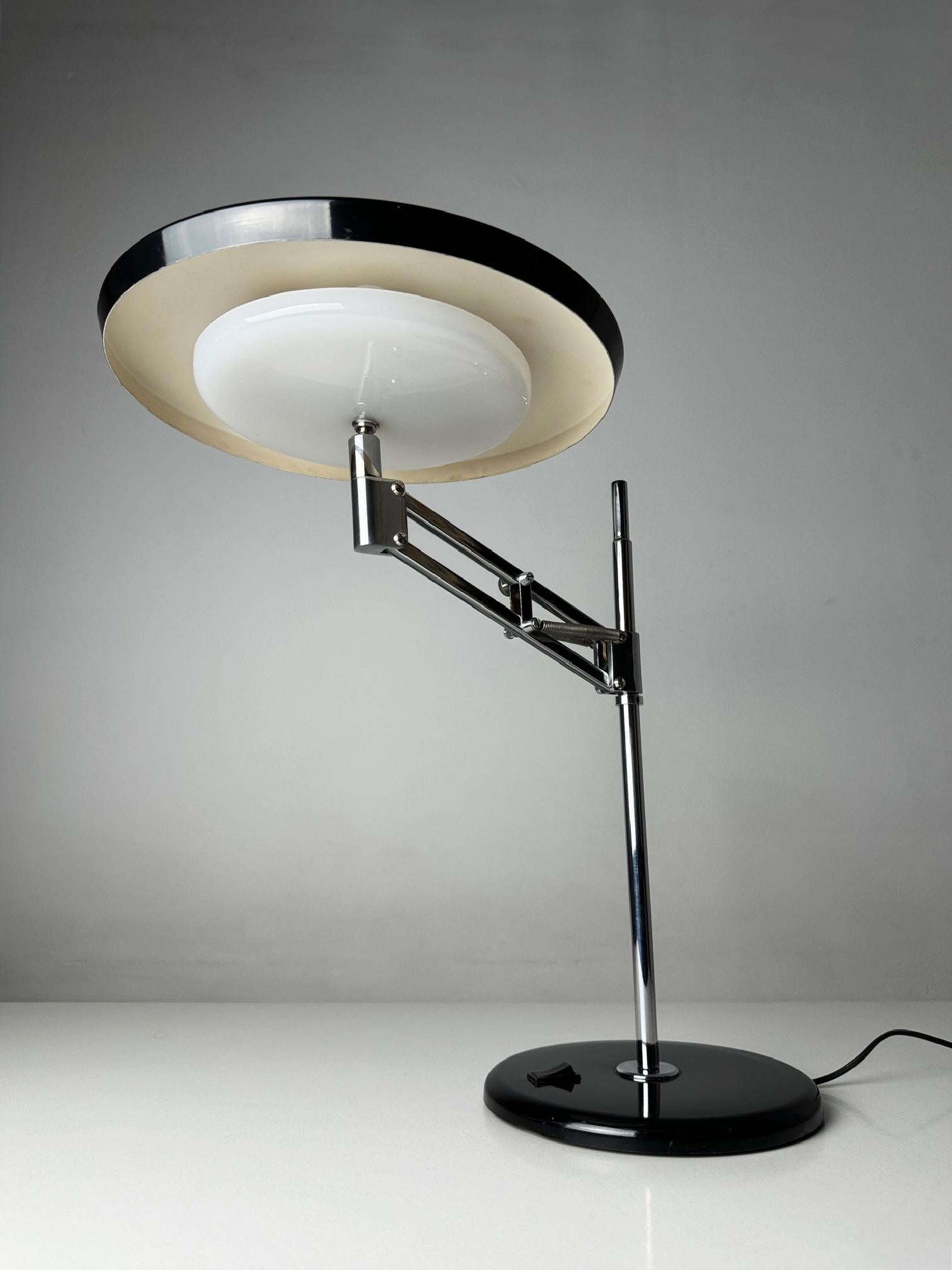 Chrome Fase Consul 66 designed in 1966 by Luis Perez de la Oliva a versatility icon