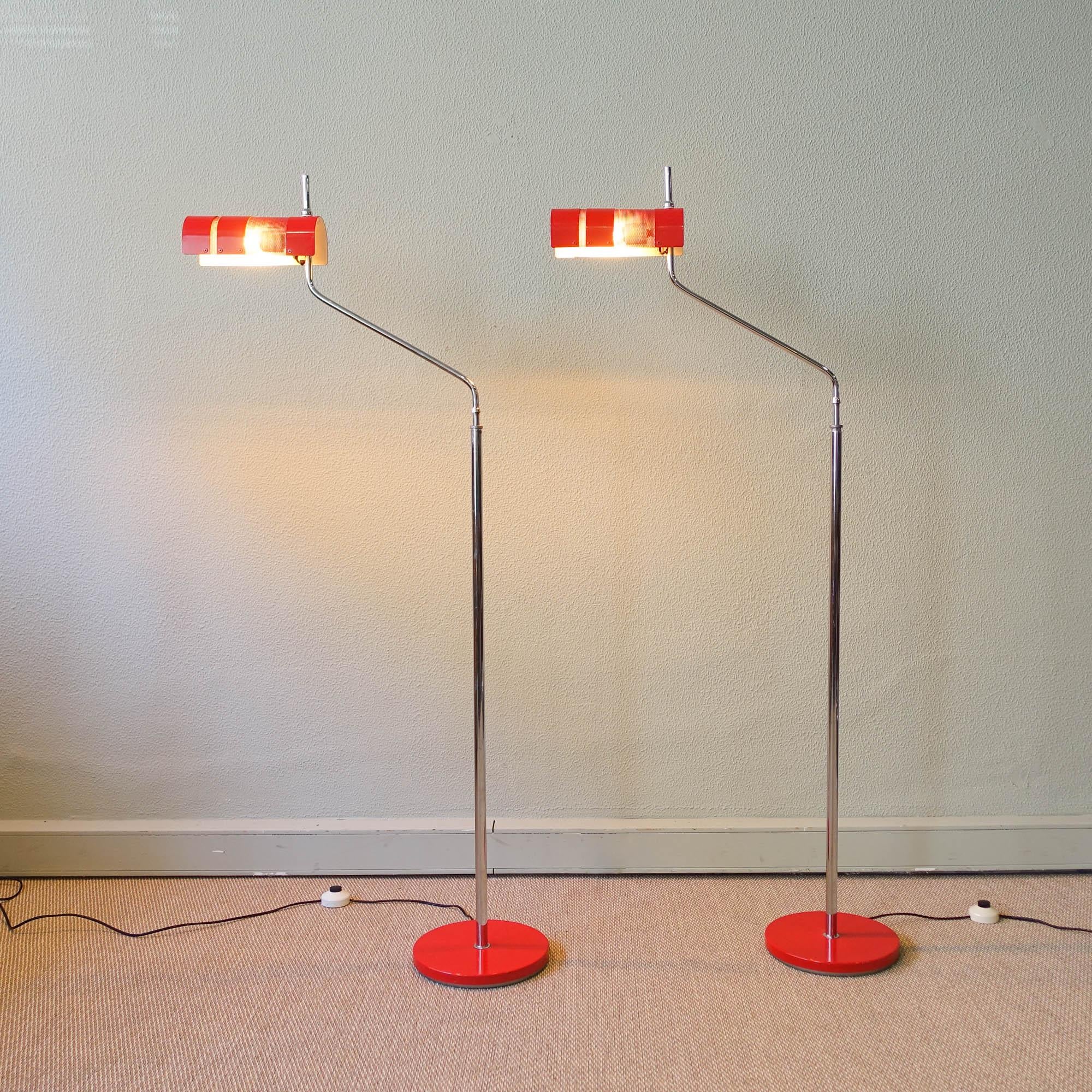 This floor lamp, model TEIDE, was designed by Gabriel Teixido, for Fase Madrid, in 1974.
It features a red shade and base with polished chrome arm. It is has a swivel shade and the arm rotates completely. It can also be adjusted by height. In an