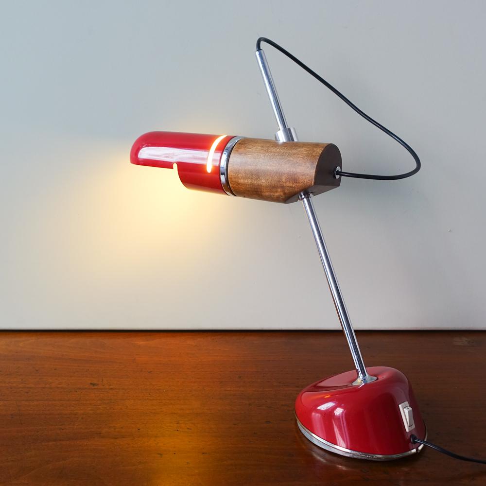 This table lamp was designed by Tomás Diaz Magro for Fase, in Spain, in 1969. It is “a beautiful model with an inclined stem, patented by Industrias Fase in 1969. It’s shade swivels allowing its light to be adjusted. The switch button is located at