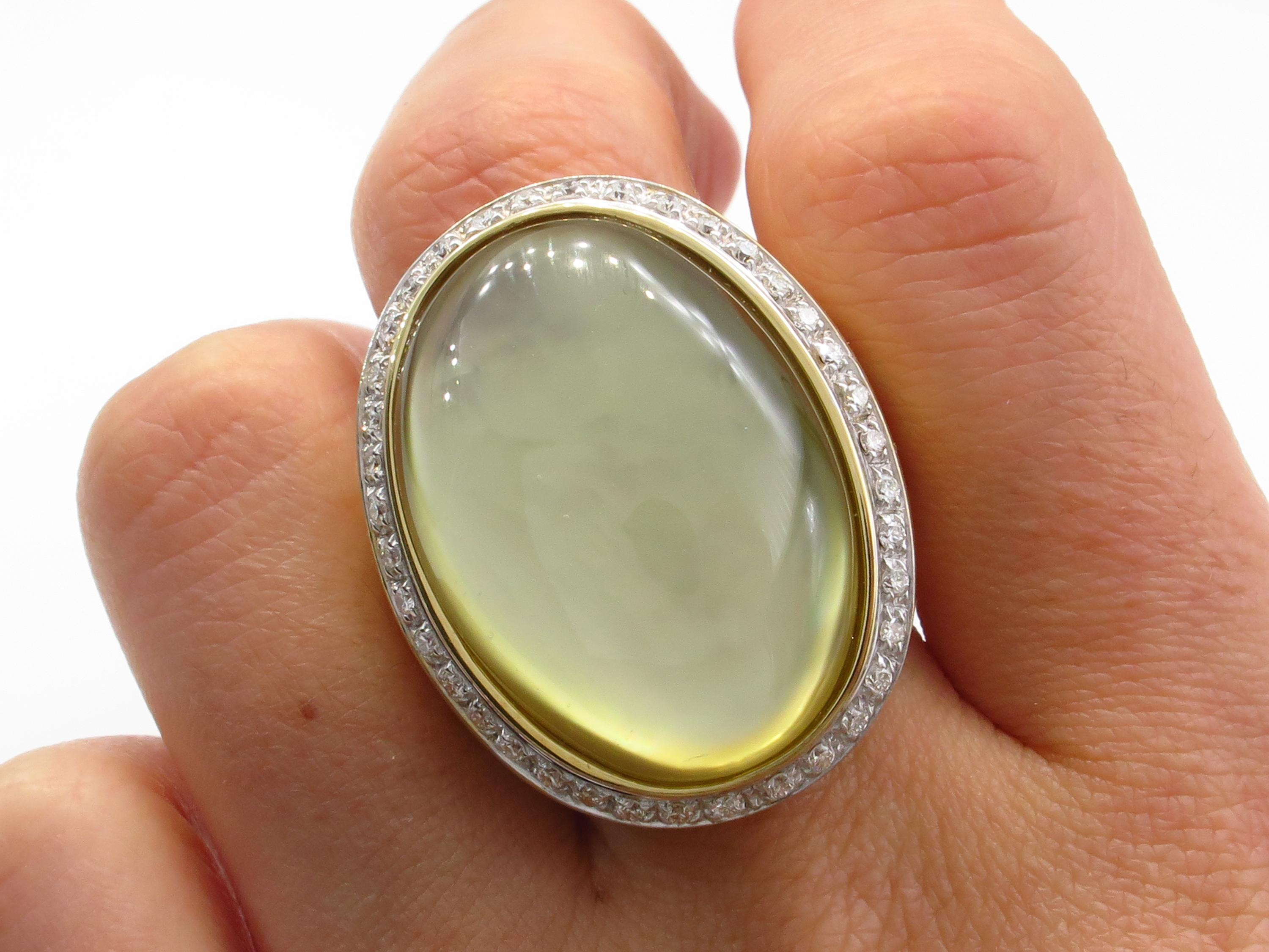 Bold and Fashionable Lemon QUARTZ over Mother-of-Pearl Ring with DIAMONDS in bright and rich 18k Yellow Gold.

A real fun Statement jewel, a gear Right Hand or Anniversary Ring! From our Estate Collection. The ring is in 18K Yellow GOLD with satin