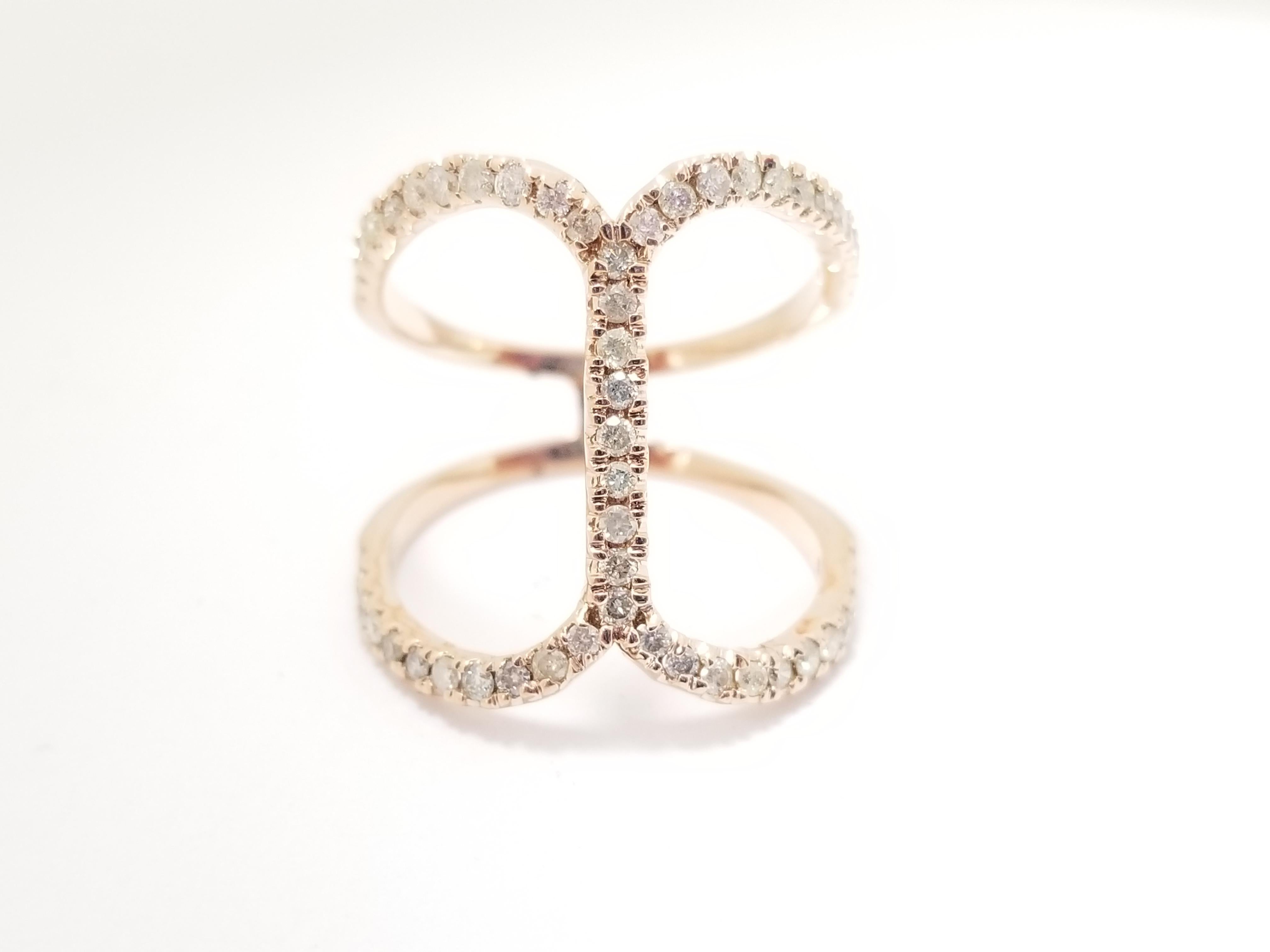 Brilliant prong-set round diamonds intersect each other in a cross design and look stunning.
Crafted in 14k Rose gold, this ring exudes understated style and elegance.
Paved-Set Diamond Cross Ring 0.55 cttw
Average Color/Clarity I Color SI-I. Ring