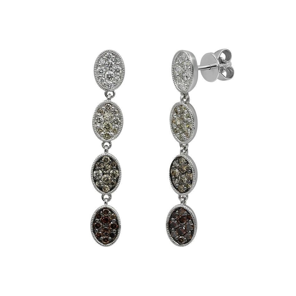 Ring White Gold 14 K (Matching Earrings Available)

Diamond 10-Round 57-0,16-G/VS1A
Diamond 40-Round 57-0,76-I/VS2A

Weight 2.66 grams
Size 17.5

With a heritage of ancient fine Swiss jewelry traditions, NATKINA is a Geneva based jewellery brand,
