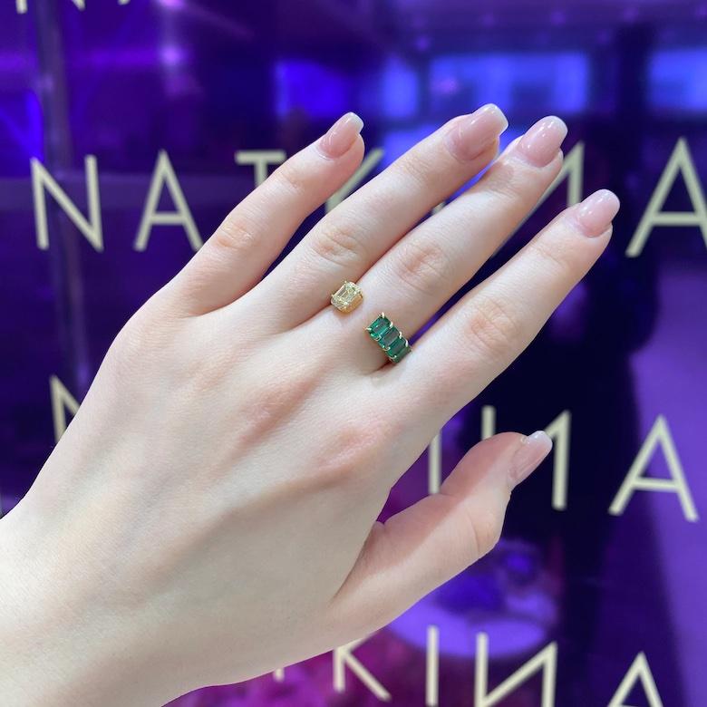 Ring Yellow Gold 18K  
Diamond 0.05 Cts/18 Pcs
Emerald 0.85 Cts/4 Pcs
Yellow Diamond 0.38 Cts/1 Pcs
Size 54

With a heritage of ancient fine Swiss jewelry traditions, NATKINA is a Geneva-based jewelry brand that creates modern jewelry masterpieces