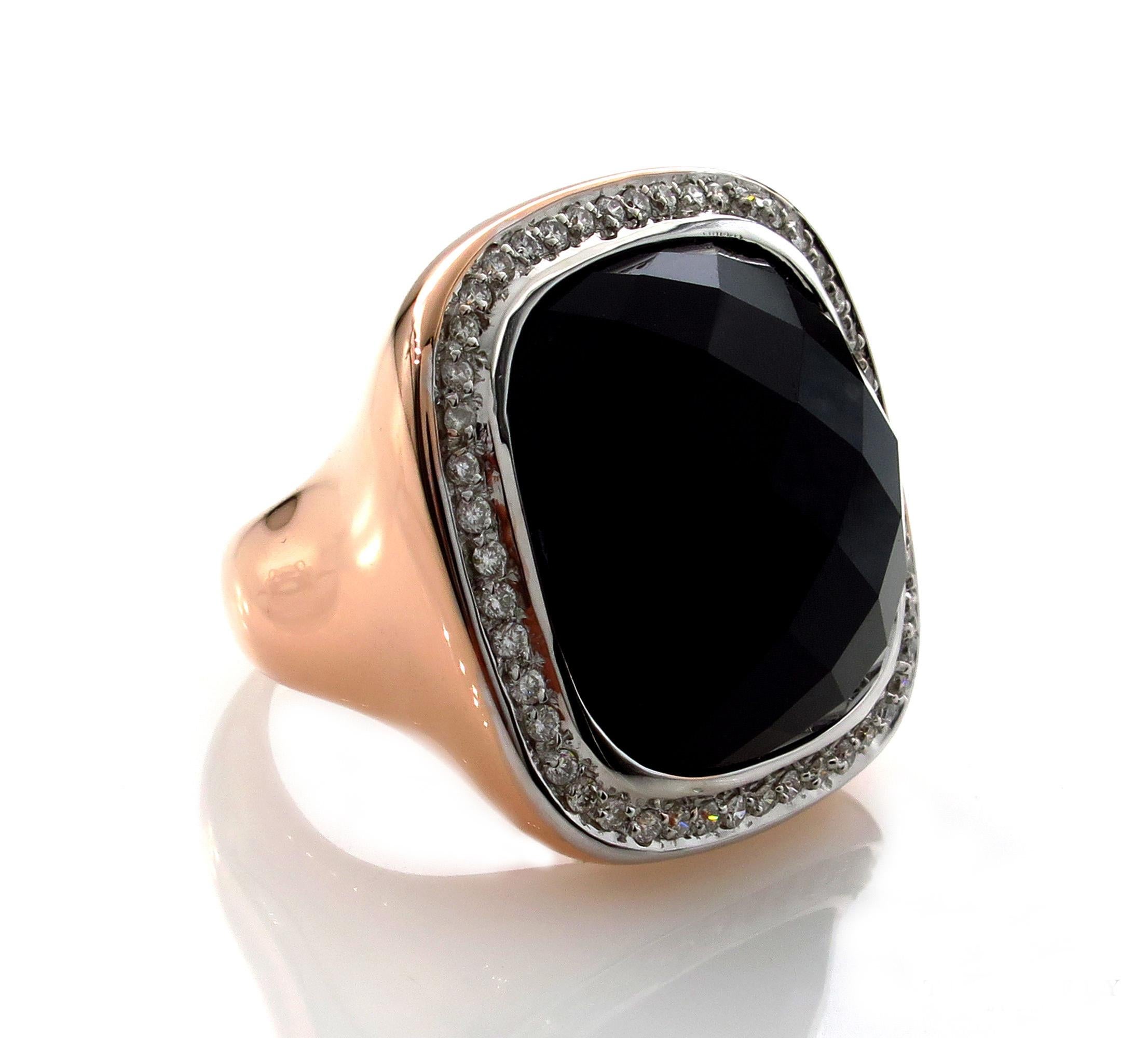 Bold and Fashionable Black Onyx Ring with Diamonds in bright and rich 18k Rose Gold.
A real Statement jewel, a great Right Hand or Anniversary Ring! From our Estate Collection. The ring is in 18K Rose Gold. The French cut Black Onyx is surrounded by
