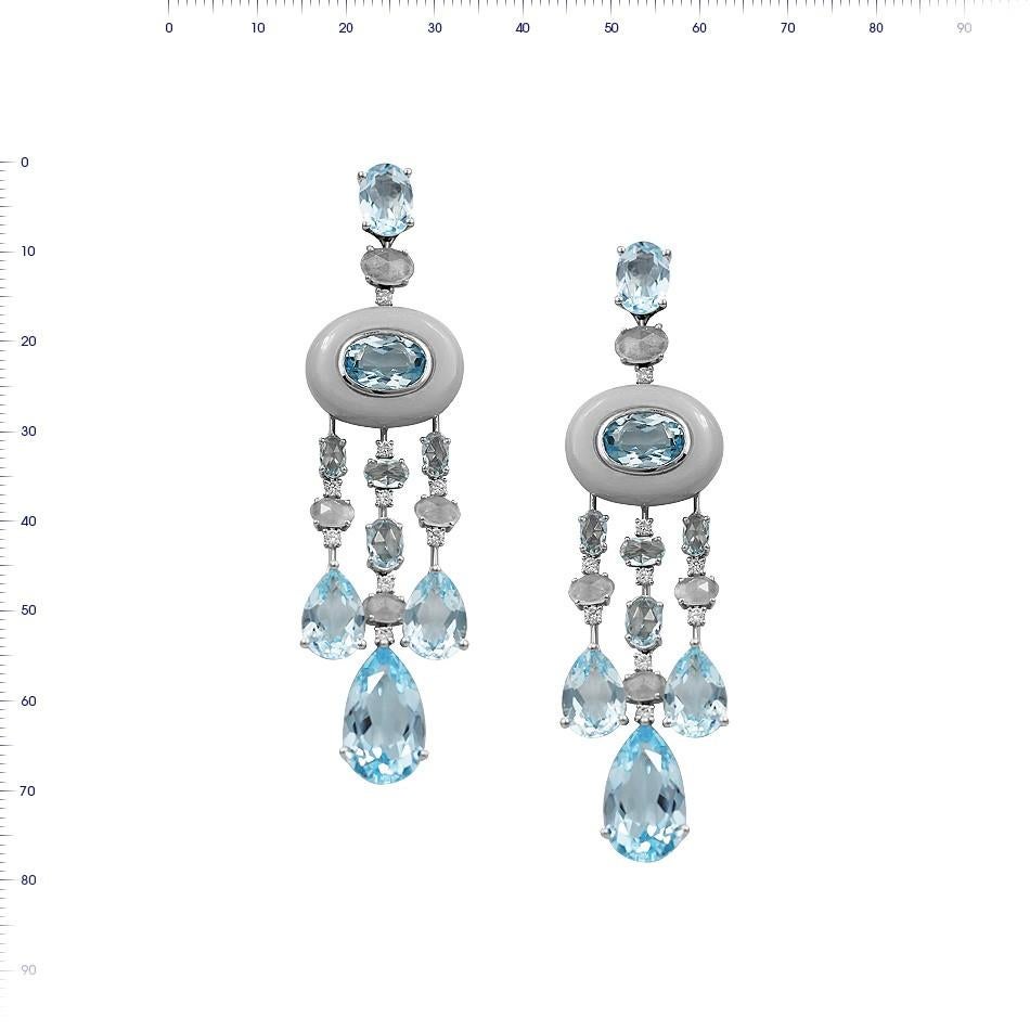 White Gold 14K Earrings (Matching Ring Available)
Weight 21.94 gram
Diamond 18-Round 57-0,45-3/6A
Topaz 6-21,59/1A
Topaz 4-7,83/1A
Topaz 8-Oval-2,55/1A
Moon Rock 2-11

With a heritage of ancient fine Swiss jewelry traditions, NATKINA is a Geneva