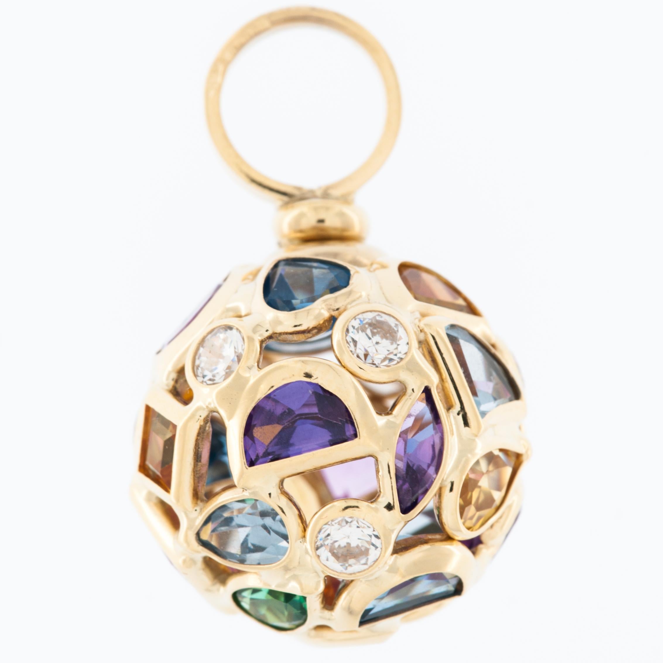 The Fashion Multi-Gem 18kt Yellow Gold Ball Pendant is a stunning and luxurious piece of jewelry that seamlessly blends elegance with contemporary style. Crafted with precision and attention to detail, this pendant is a true work of art.

At its