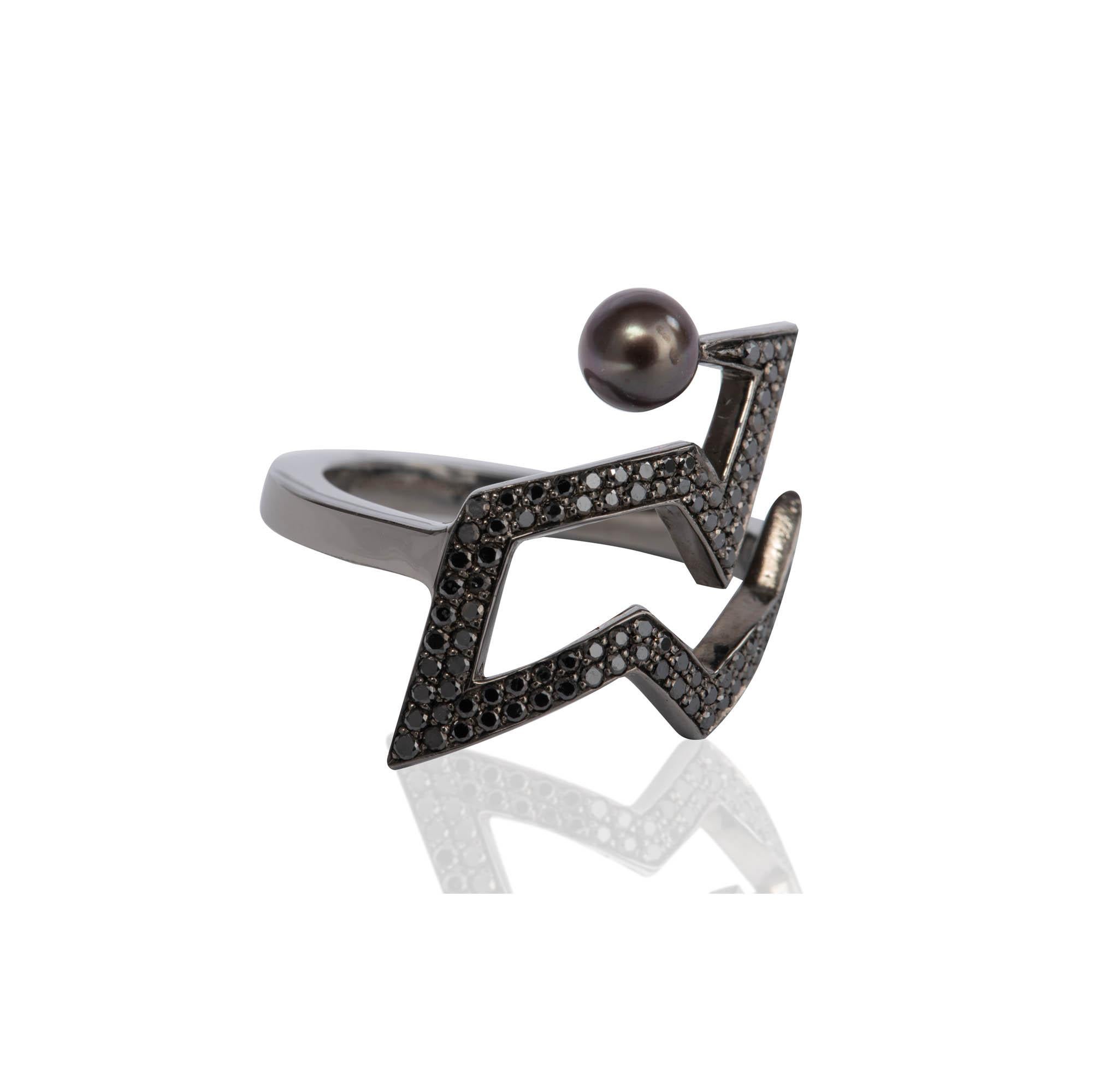 Cocktail Ring in black rhodium over polished sterling silver, set with black diamonds and peacock pearl
Size UK N - US 7 in stock, more sizes available upon request, made to order pieces aren't returnable
Elegant and modern design inspired by the