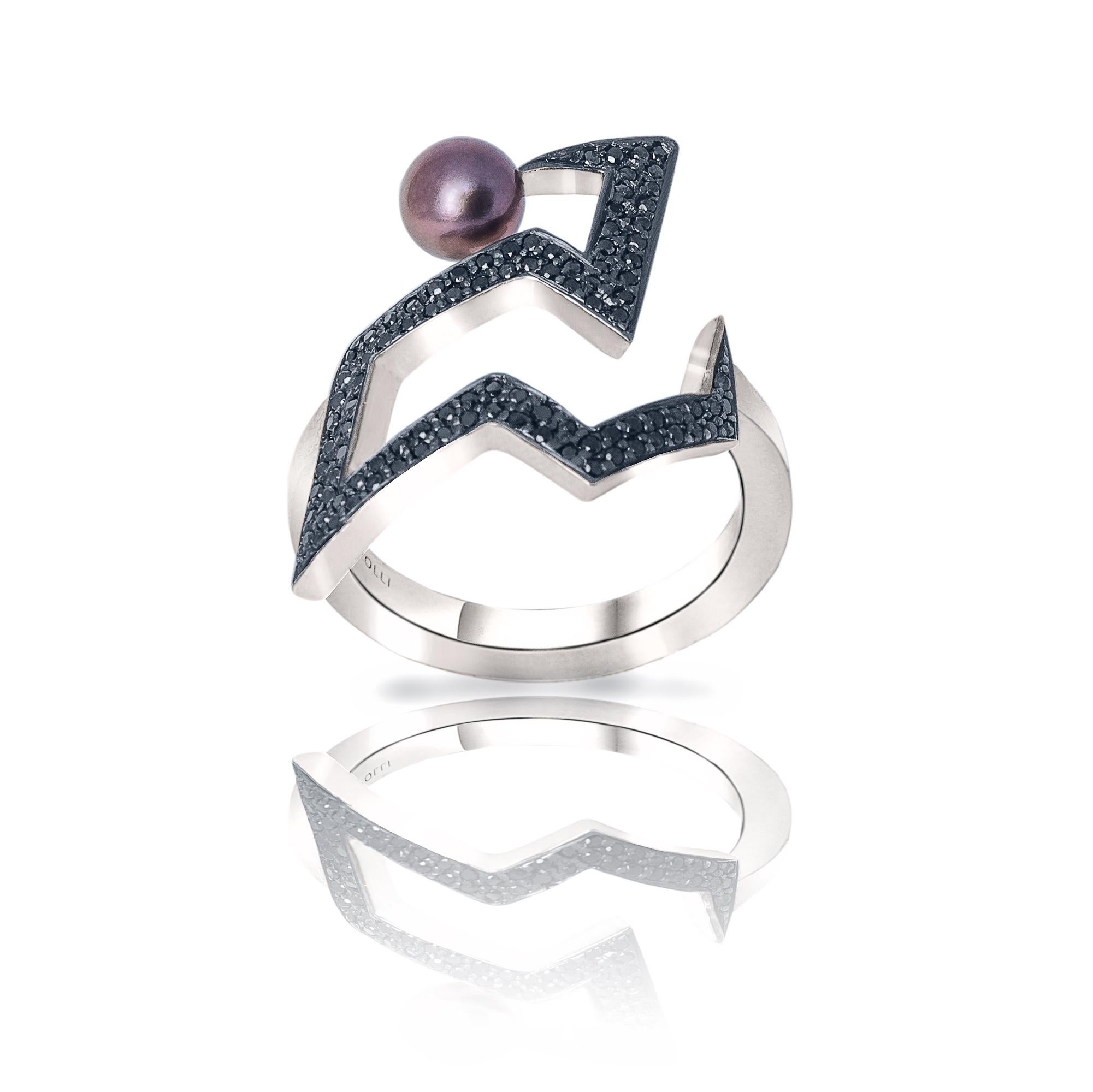 Ring in polished sterling silver, set with black diamonds and peacock pearl
Size UK M 1/2 - US 6 1/2 in stock, more sizes available upon request, made to order pieces aren't returnable
Elegant and modern design inspired by the '60s space age