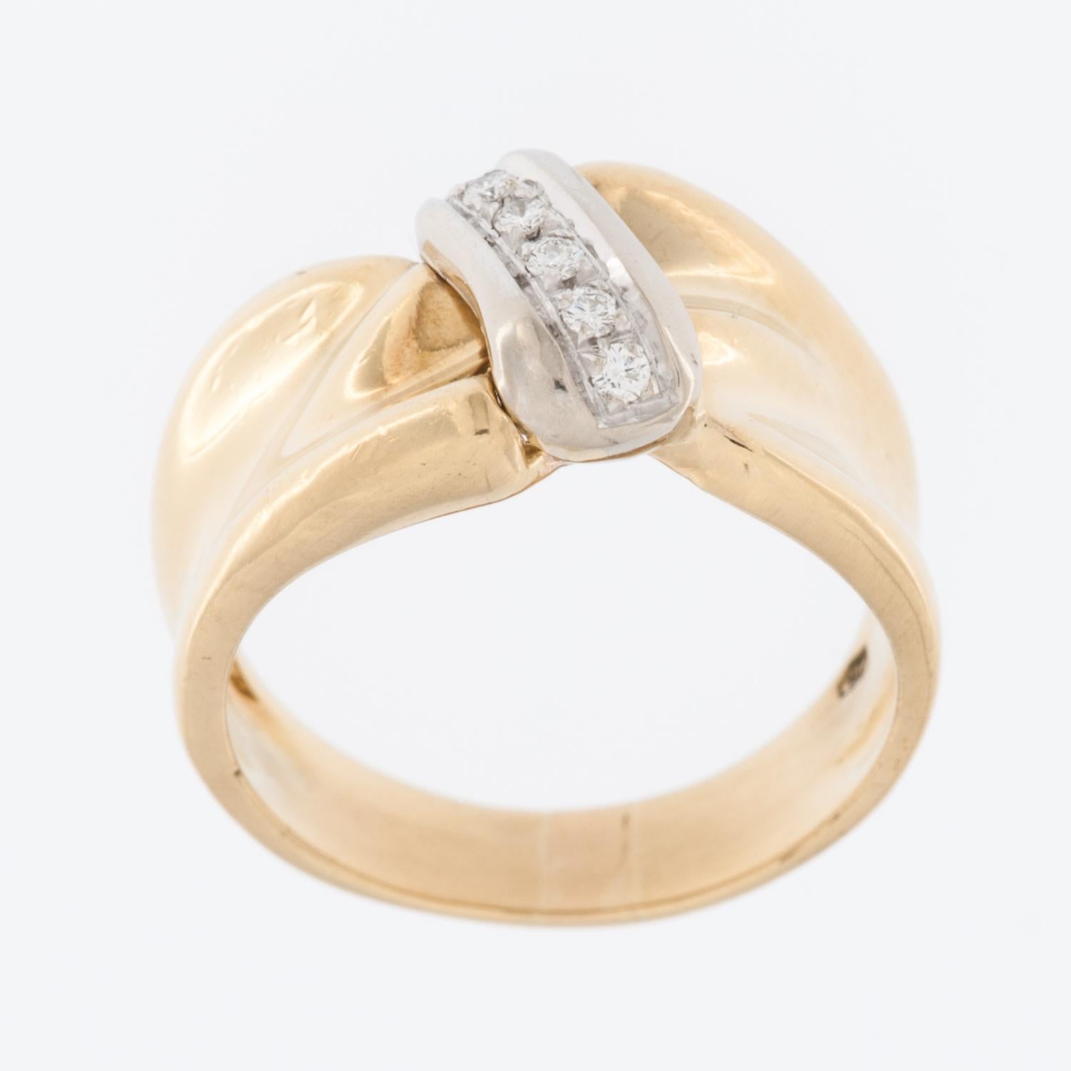 The Fashion Swiss 18kt Yellow and White Gold Ring with Diamonds is a stunning piece of jewelry that seamlessly combines luxurious materials with exquisite design elements.

Crafted with precision and artistry, the ring features a blend of 18kt