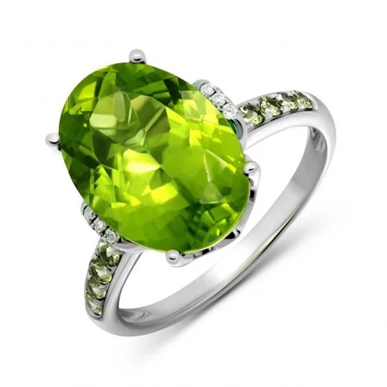 Ring White 14K Gold (Topaz Stone Ring Also Available)
Diamond 6-RND57-0,03-4/5А
Chrysolite 10--RND-0,25 3/2A 
Chrysolite 1-5,96 1/2A

Weight 3,38 grams
Size 7,2 US 

It is our honour to create fine jewelry, and it’s for that reason that we choose to