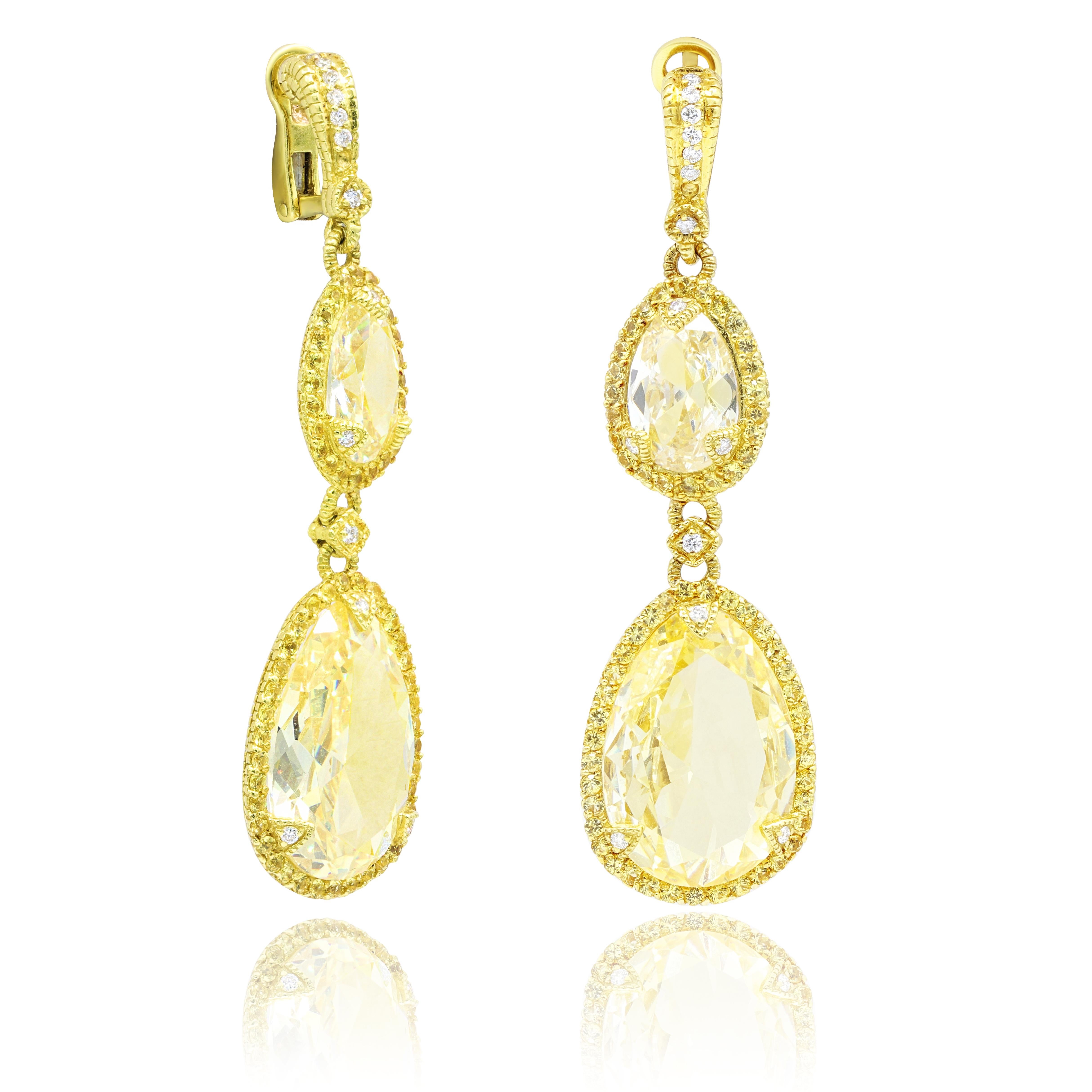 18KT Yellow gold citrine and yellow sapphire earrings, features 40.00ct of Oval Citrine, 5.00 ct of yellow sapphires.