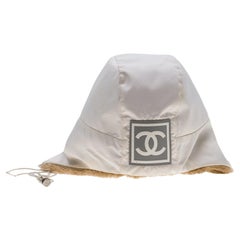 Fashionable Collector Chanel cream white Ski hat