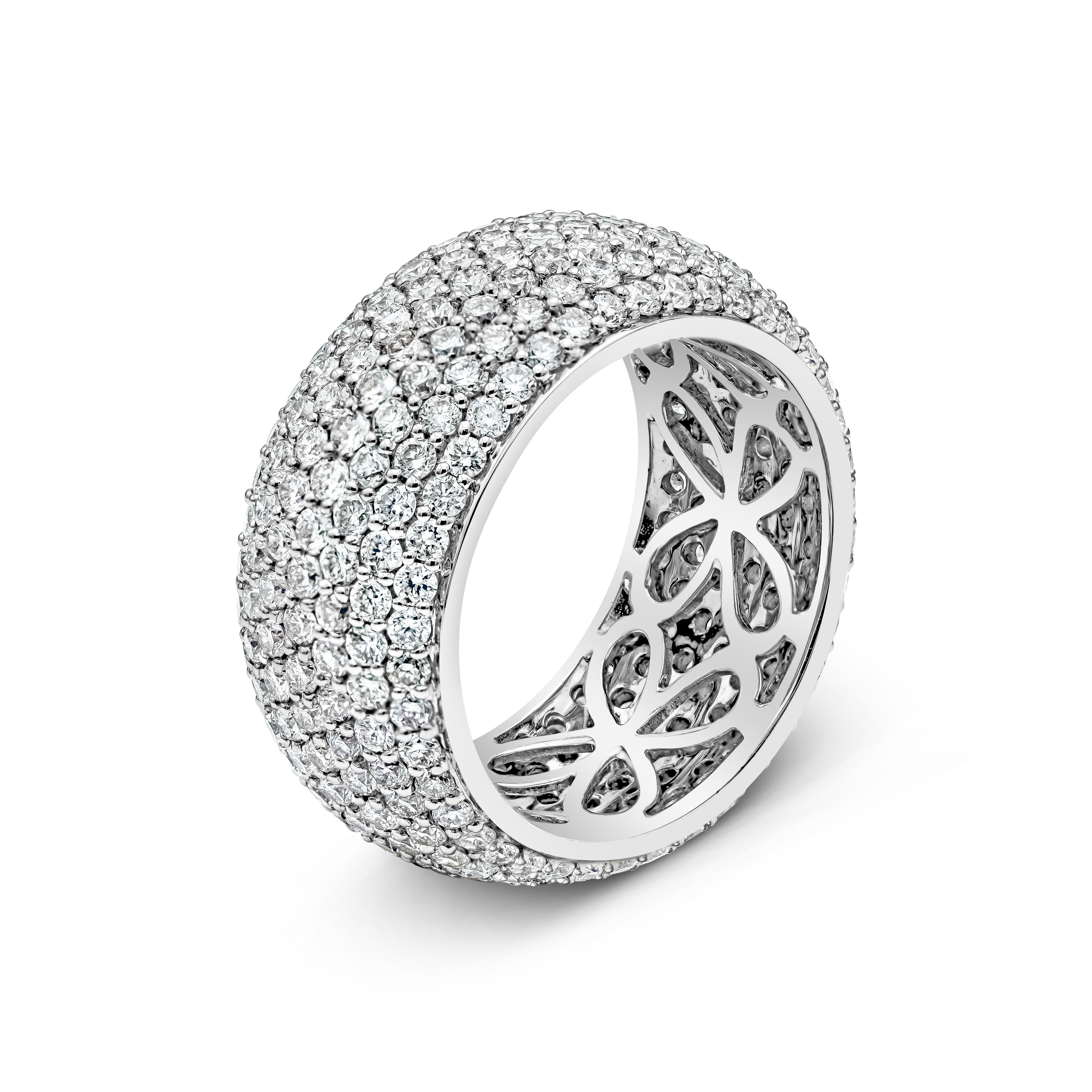 A dazzling wide wedding band, showcasing seven rows of 294 round brilliant cut diamonds weighing 4.06 carats total, set on a domed micropavé setting. Finely made with 18K white gold. Size 6.5 US. 

Roman Malakov is a custom house, specializing in