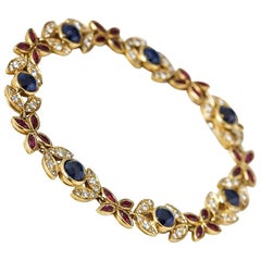 Vintage Fasoli 18 Karat Yellow Gold Sapphire Ruby Diamond Bracelet