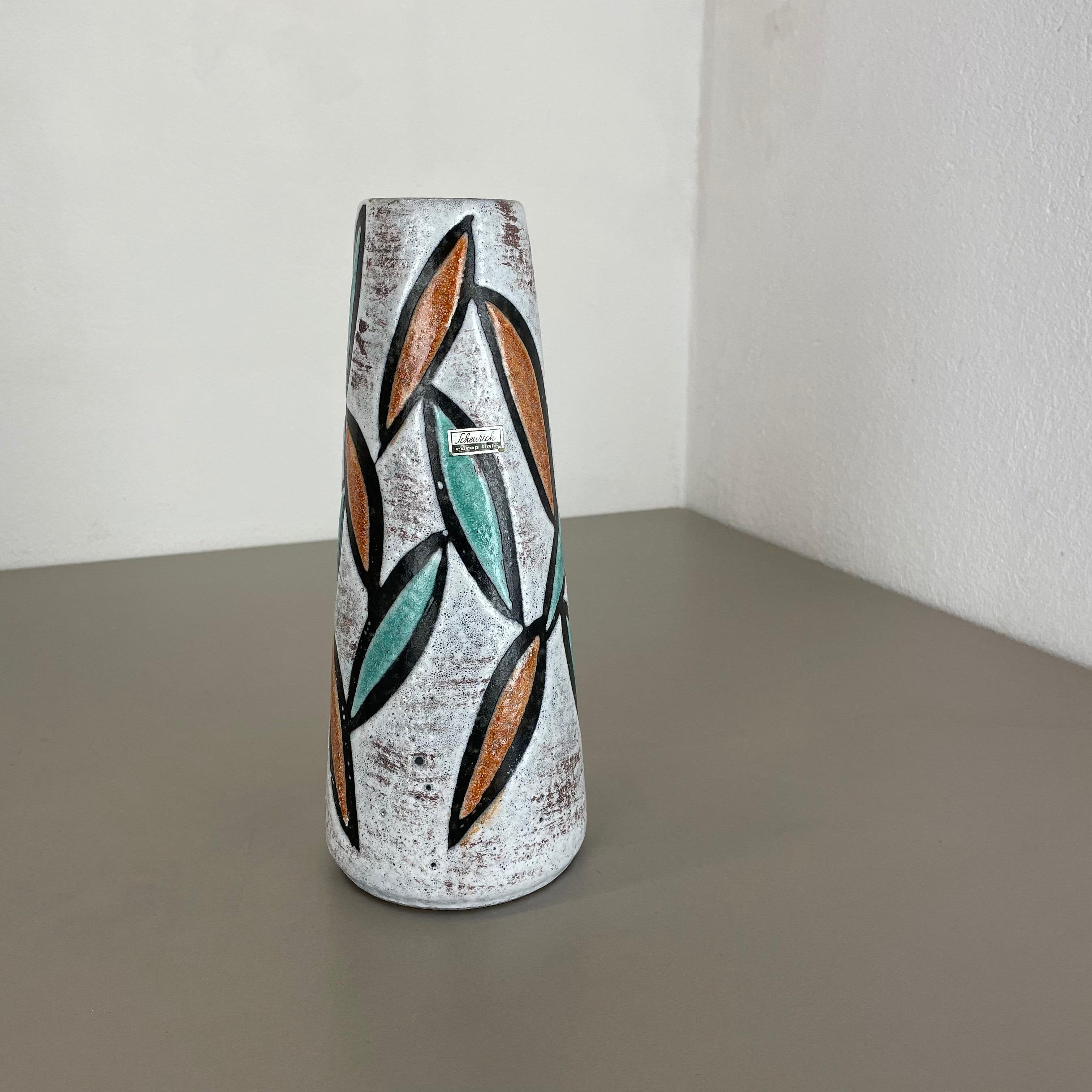 Article:

Fat lava art vase, abstract floral illustration


Producer:

Scheurich, Germany



Decade:

1970s




This original vintage vase was produced in the 1970s in Germany. It is made of ceramic pottery in fat lava optic with