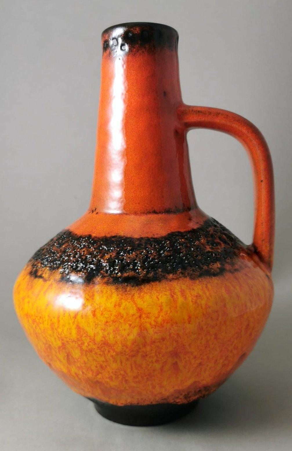 We kindly suggest you read the whole description, as with it we try to give you detailed technical and historical information to guarantee the authenticity of our objects.
Peculiar and original German ceramic jug colored with a beautiful shade of