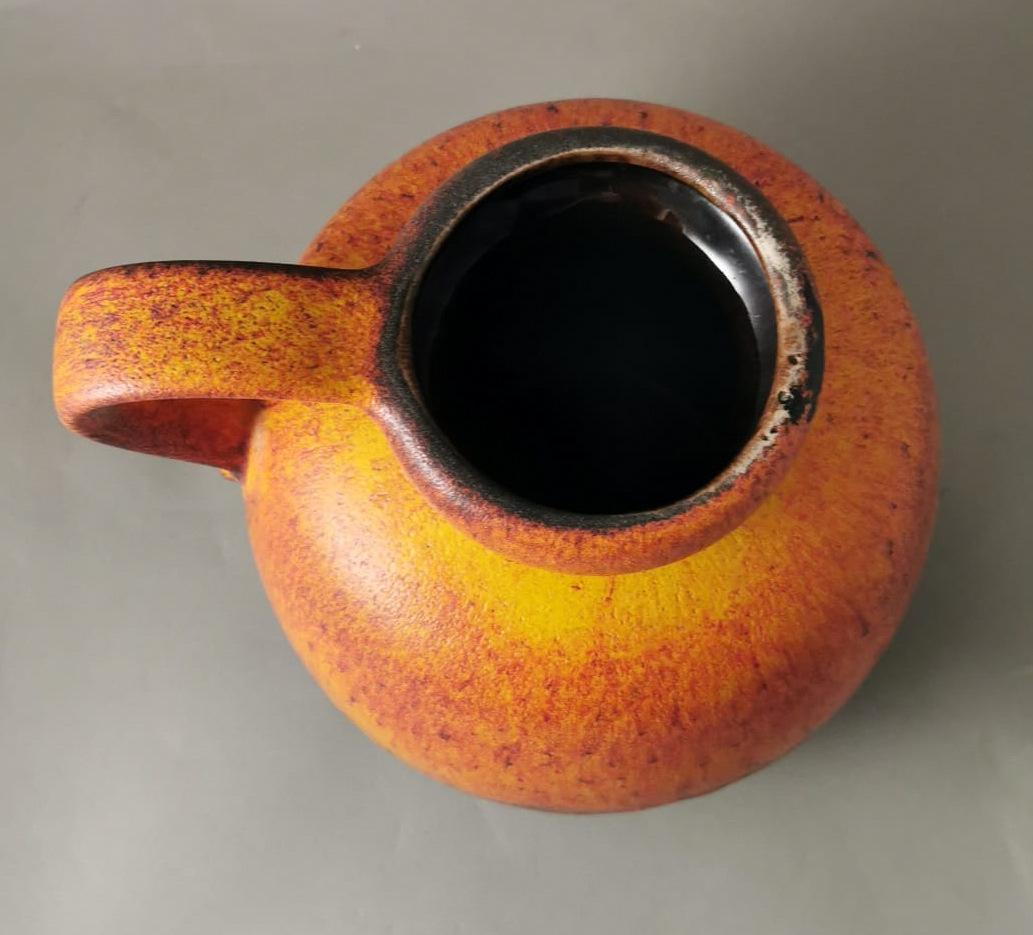 Fat Lava German Jug With Colored And Glazed Ceramic Handle For Sale 1