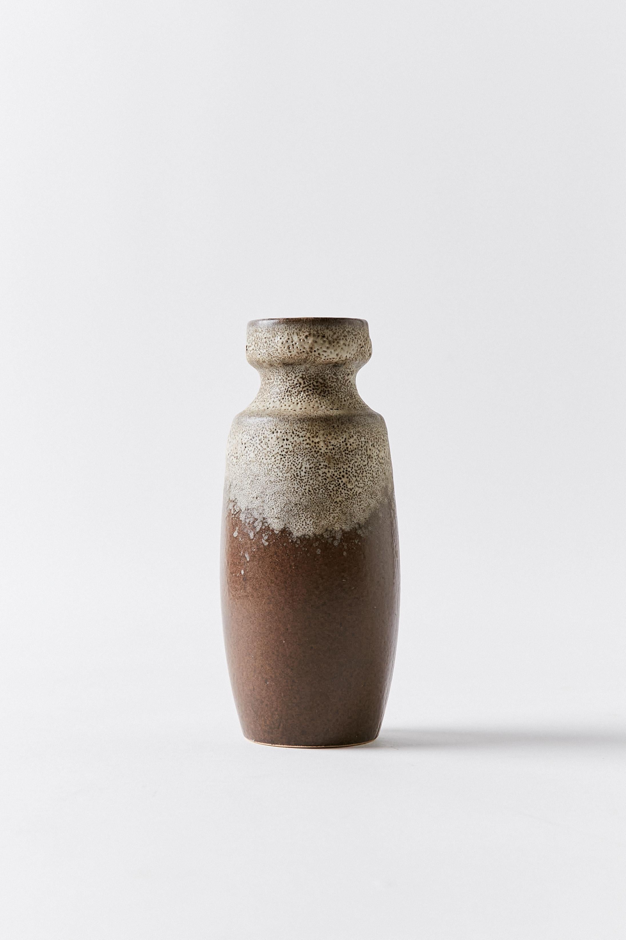 Fat lava vase in brown and textured grey tones. Made in West Germany in 1960s. Signature stamp on bottom.