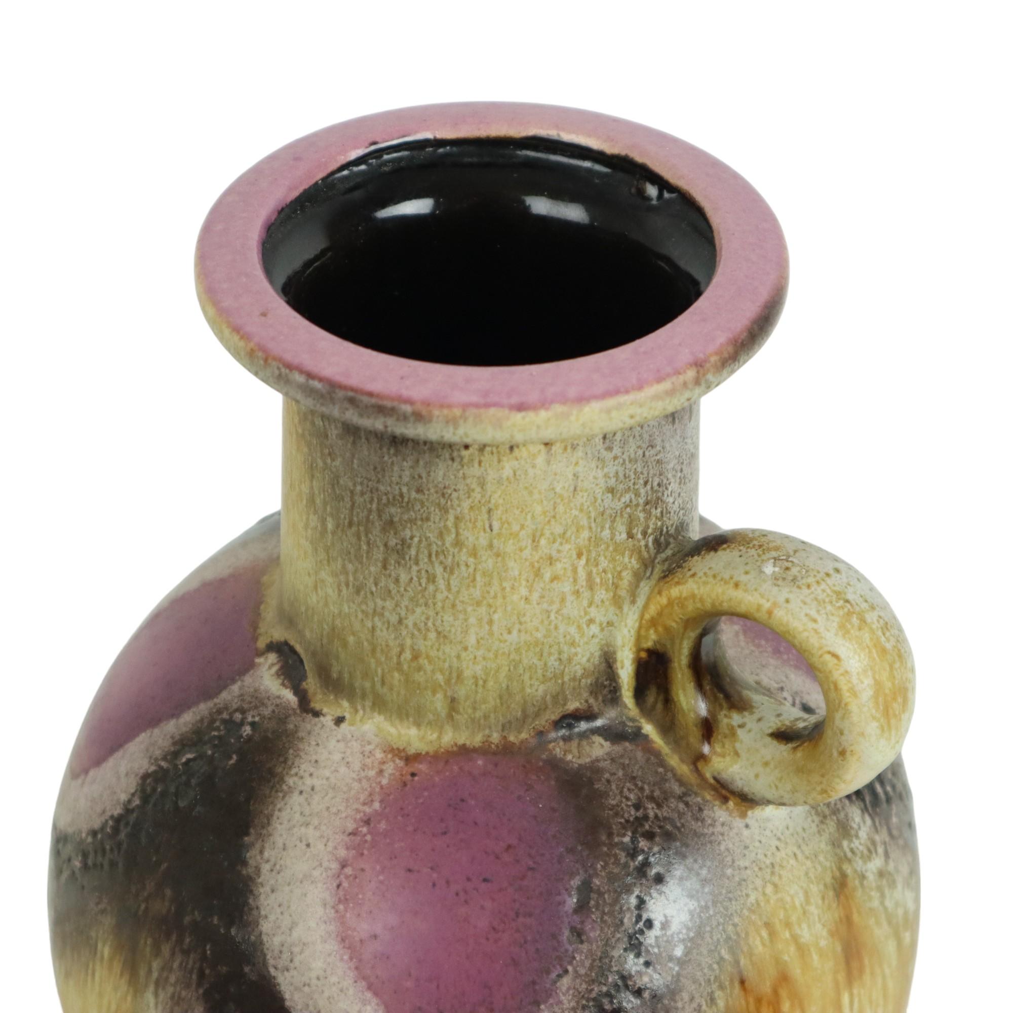 Schöne Vintage Fett Lava Vase, braun, creme und lila, West-Deutschland Keramik, von Dumler & Breiden, markiert und nummeriert 667-25 an der Unterseite, 1960s-70er Jahre.

Westdeutschland war eigentlich eine Sammelbezeichnung für Keramiken, die etwa