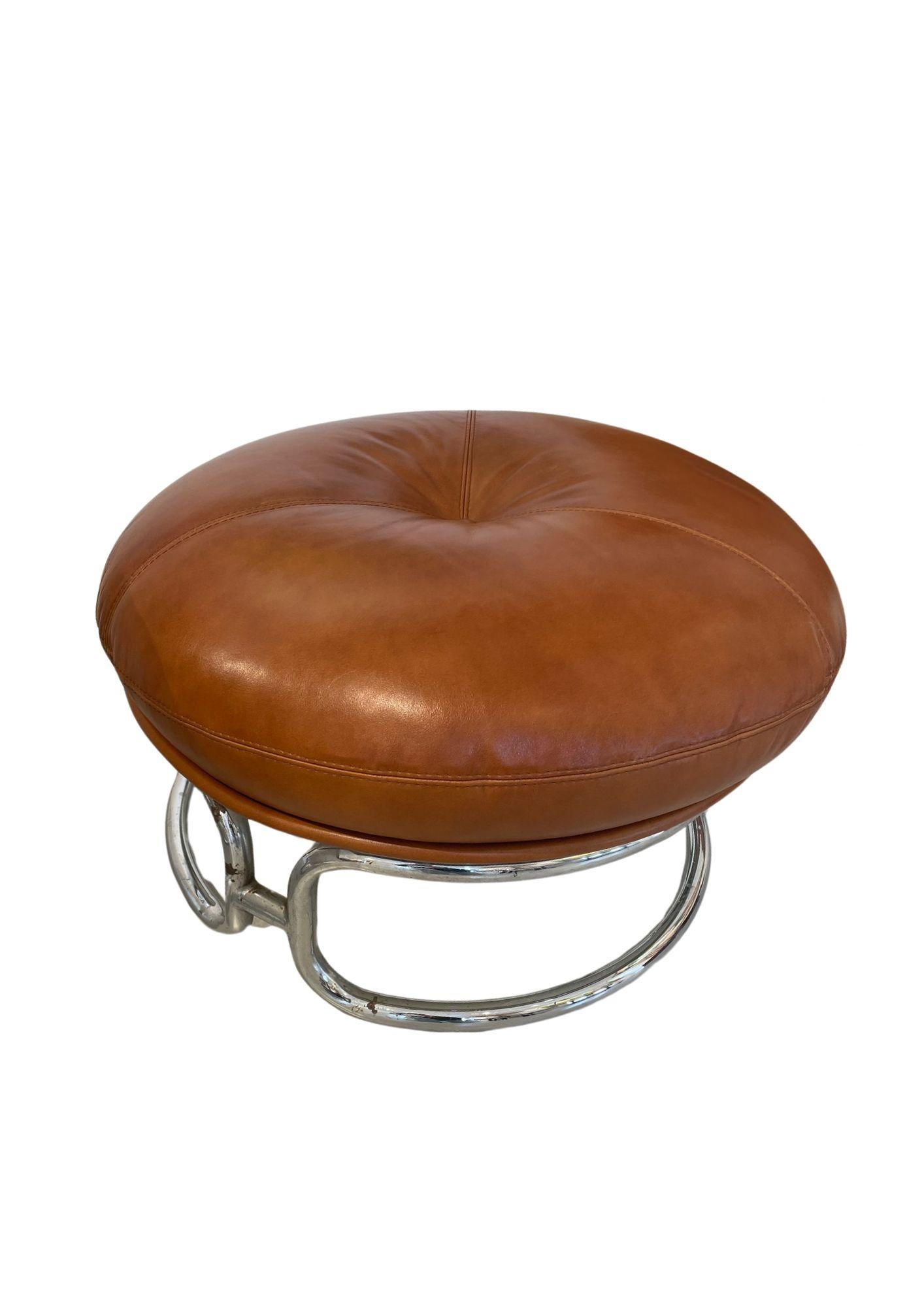 Pair of leather armchairs by French designer Michel Cadestin