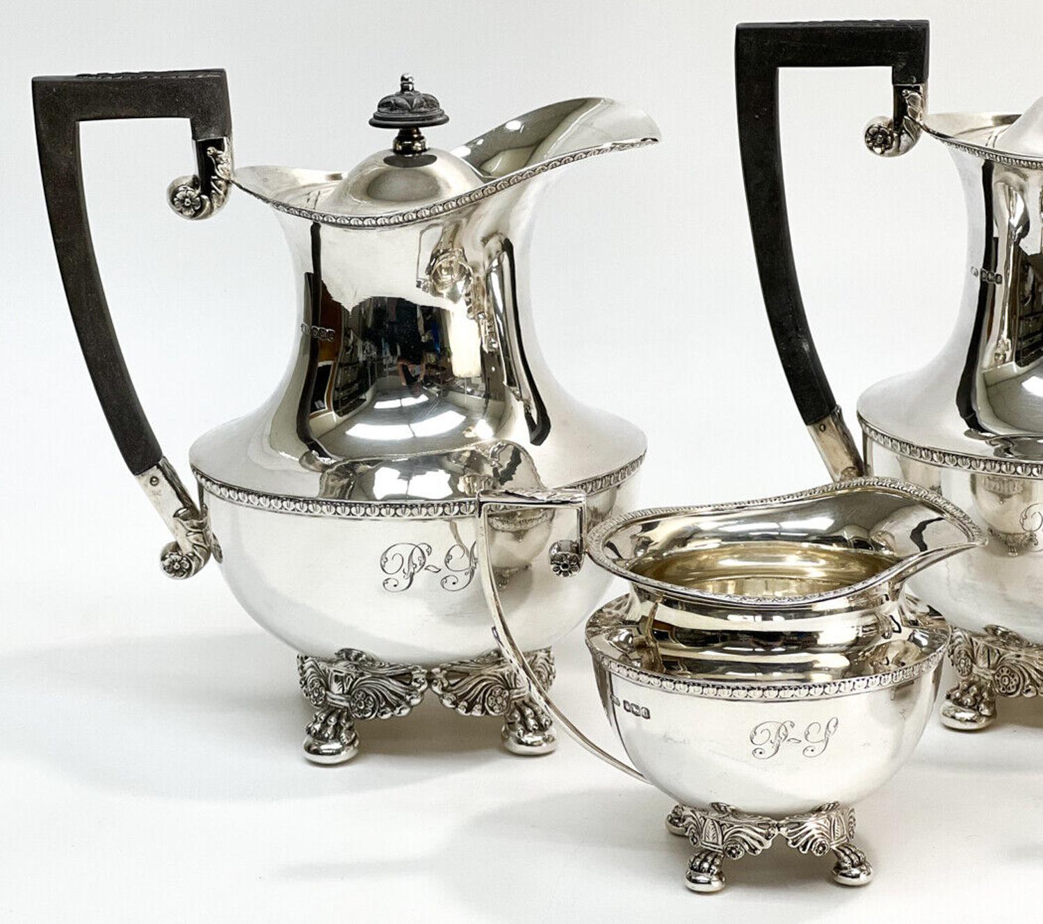 5 piece English sterling silver tea set Fattorini & Sons Ltd Sheffield, 1921. . Hand chased rim with leaves to the handle. Fattorini & Sons sterling silver hallmarks. The feet taking the form of winged claws, the wood nicely engraved acanthus. The