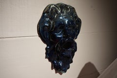 Faun mask in flamed sandstone from Rambervillers