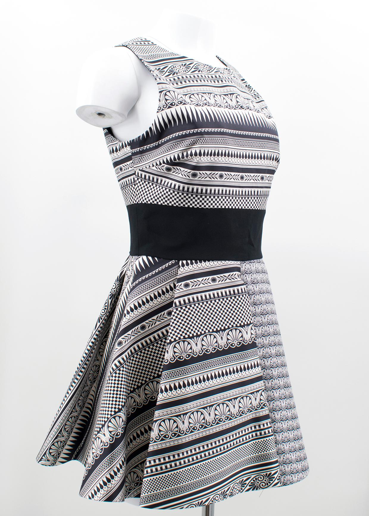 Fausto Puglisi Greek Inspired A-line Sleeveless Dress with full skirt and black waistband. 

Fabric: 100% Silk

Please note, these items are pre-owned and may show signs of being stored even when unworn and unused. This is reflected within the
