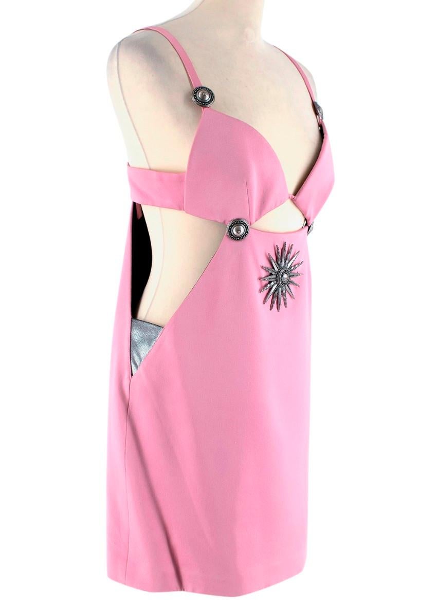 Faustou Puglisi Cut-out Pink Dress

- Medallion silver embellishments on the front of the dress
- Cut out material on the waistline 
- Thick material with a slight gloss to the fabric 
- Pink slightly textured viscose
- Black lining
- Adjustable