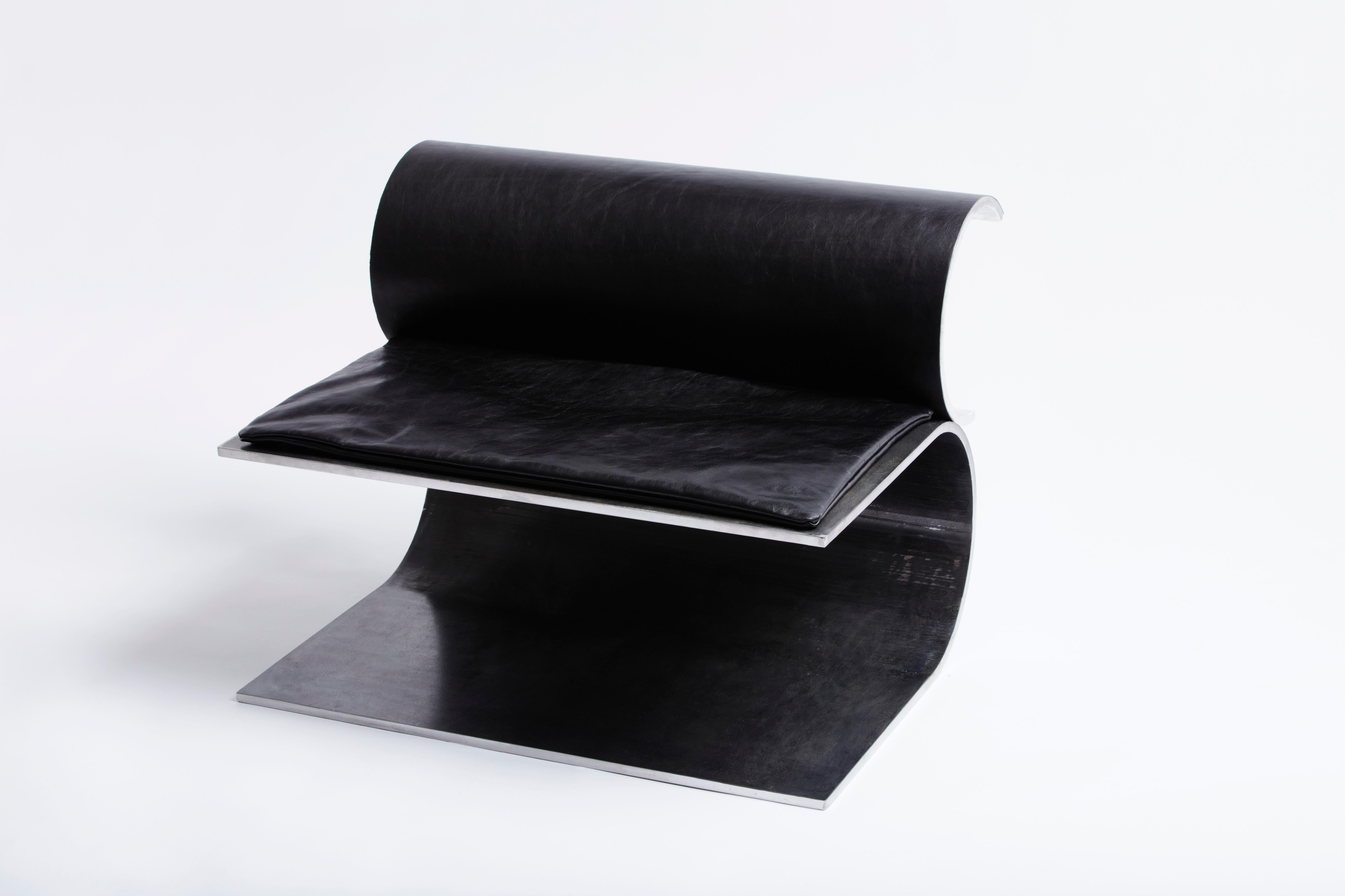 Fauteuil by Rue Intérieure
Dimensions: 76 x 64 x H 56 cm
Materials: Steel, leather
Designed and made in Montreal, Canada

Fine and elegant lines, the Fauteuil is made of two metal sheets rolled and juxtaposed together to create a