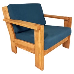 Fauteuil chauffeuse vintage en pin années 80