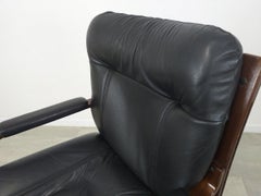 Fauteuil de bureau simili cuir en état moyen