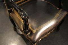 Fauteuil en bois laqué