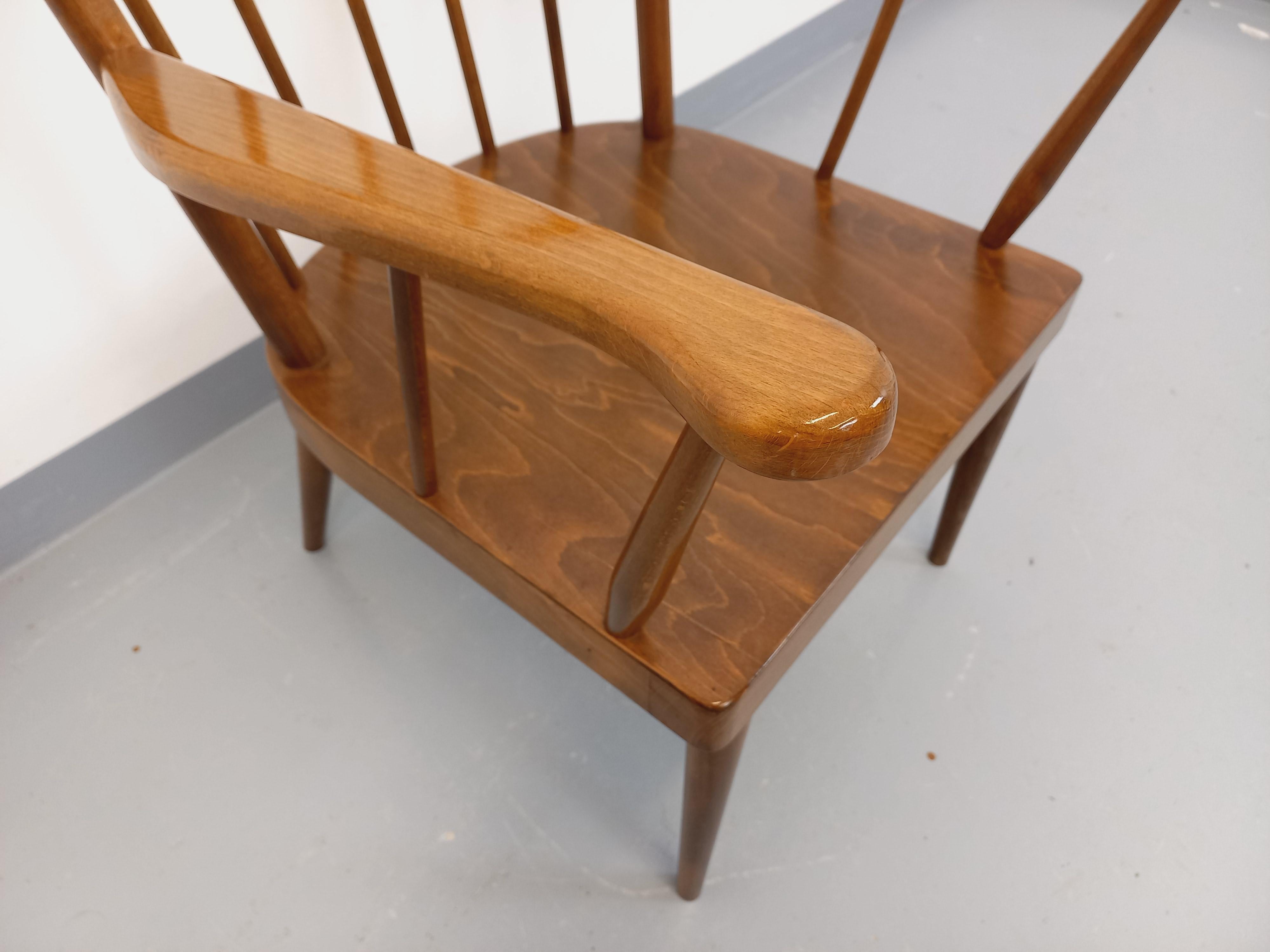Bois Fauteuil en bois vintage Baumann modèle Éventail des années 60 en vente