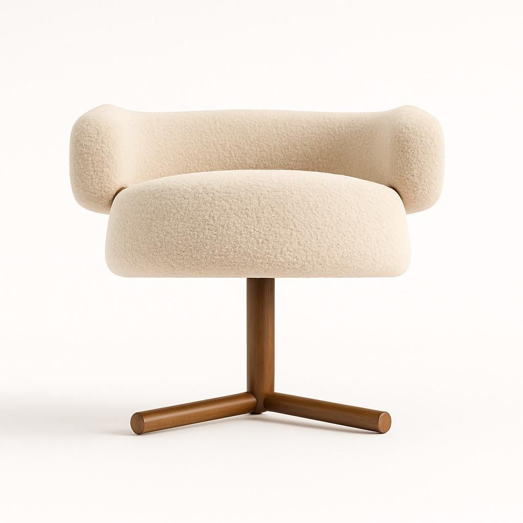 Ce fauteuil au design élégant et moderne se distingue par ses courbes accueillantes et son allure sculpturale. Son assise généreuse et arrondie, associée à un dossier enveloppant, invite à la détente tout en offrant un excellent confort. Le