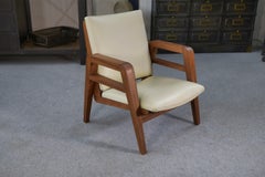Fauteuil moderniste en acajou et skaï 1940-1950's