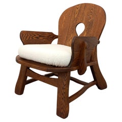 Fauteuil vintage brutaliste en bois massif et tissu bouclette des années 60