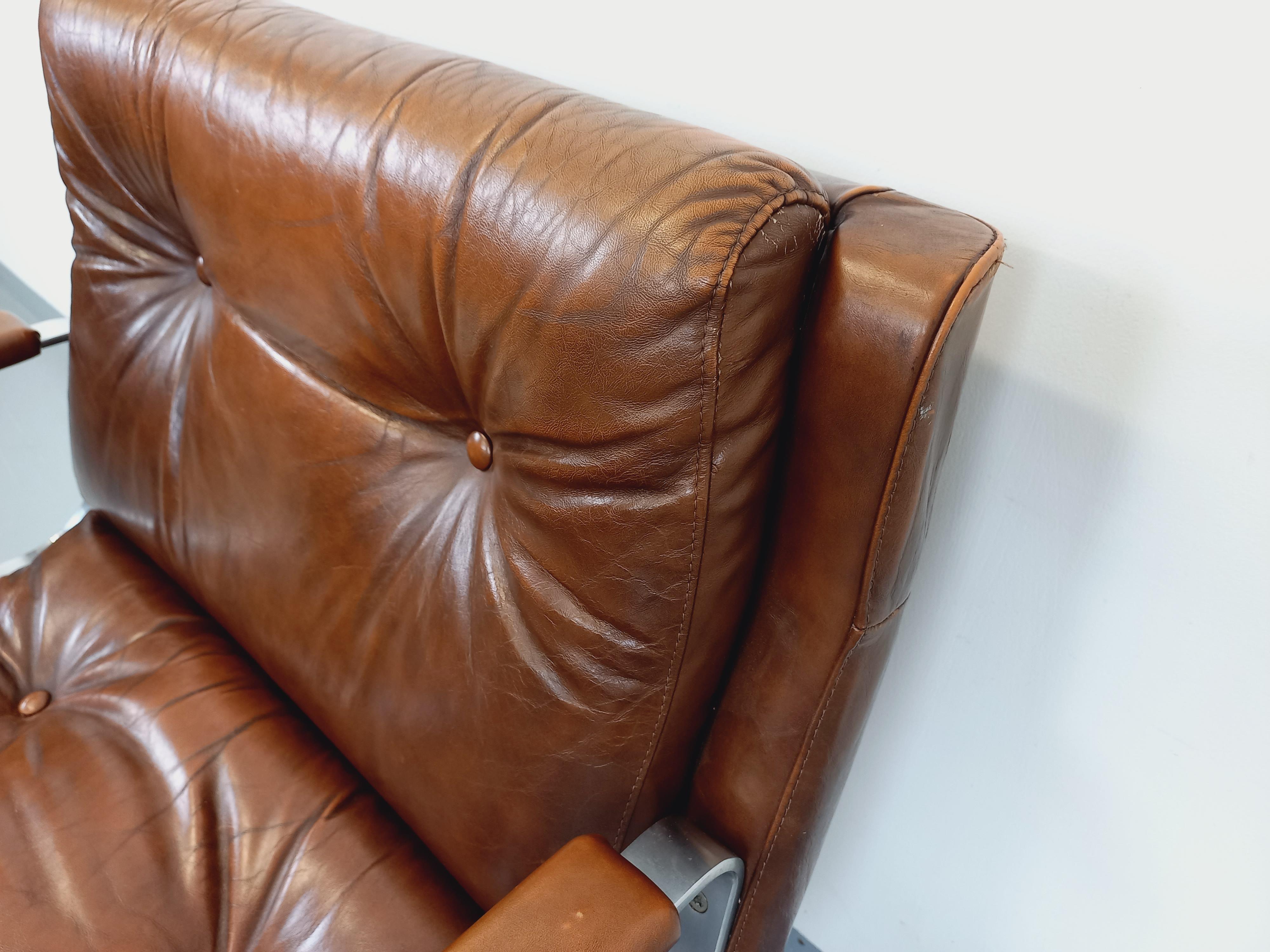 Fauteuil vintage Raphaël Raffel en cuir et acier des années 70 6