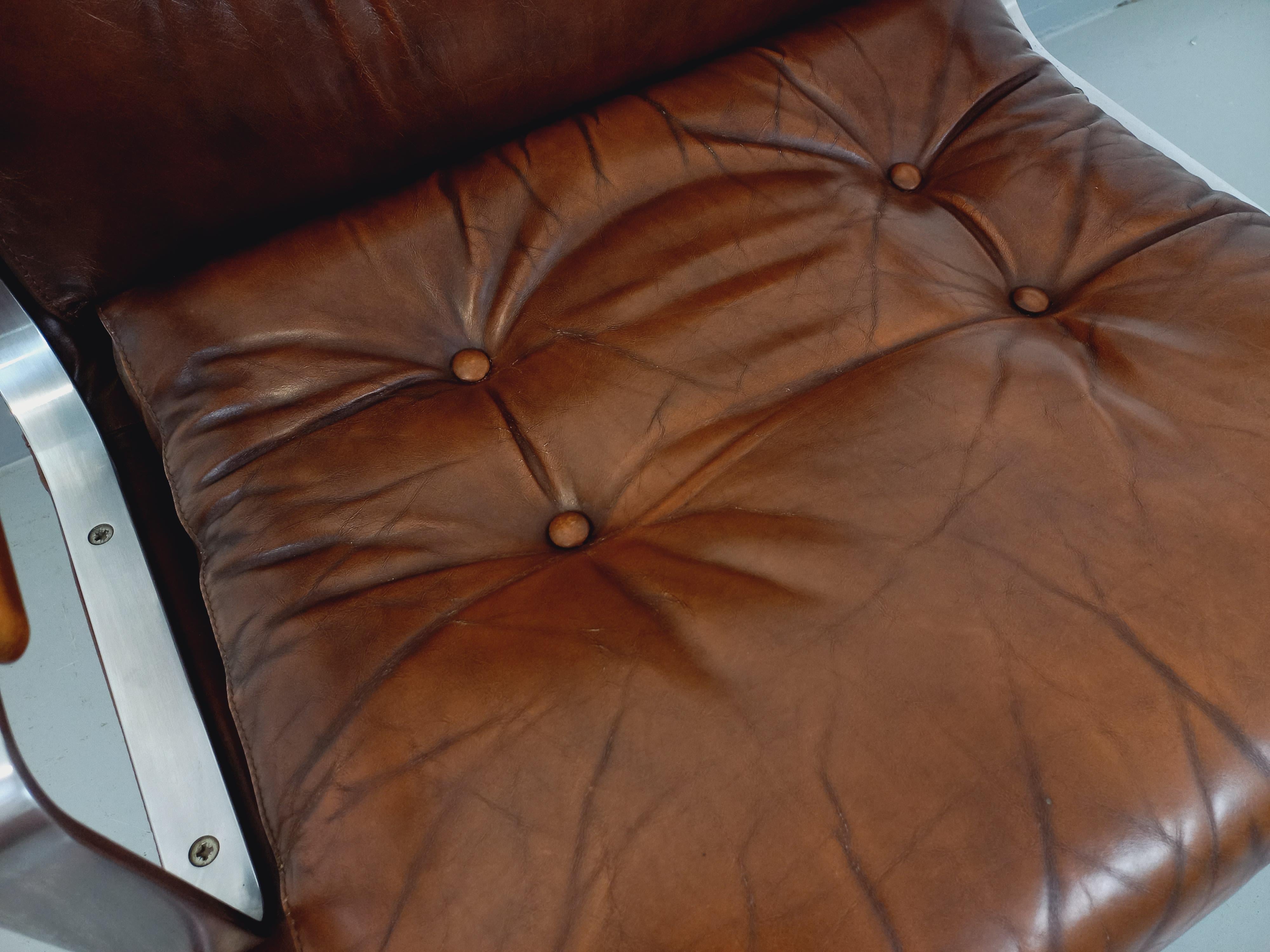 Fauteuil vintage Raphaël Raffel en cuir et acier des années 70 8
