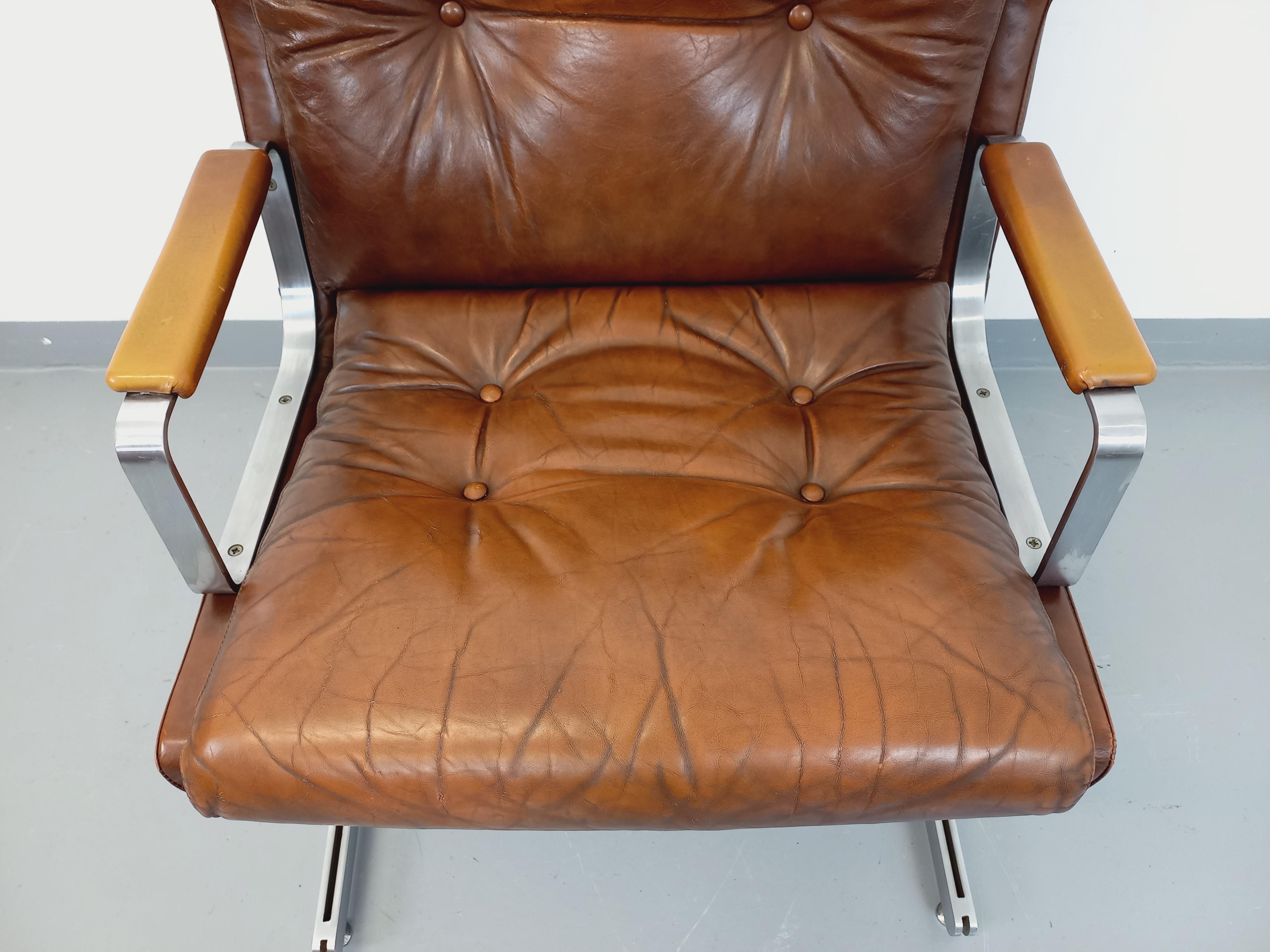 Fauteuil vintage Raphaël Raffel en cuir et acier des années 70 1