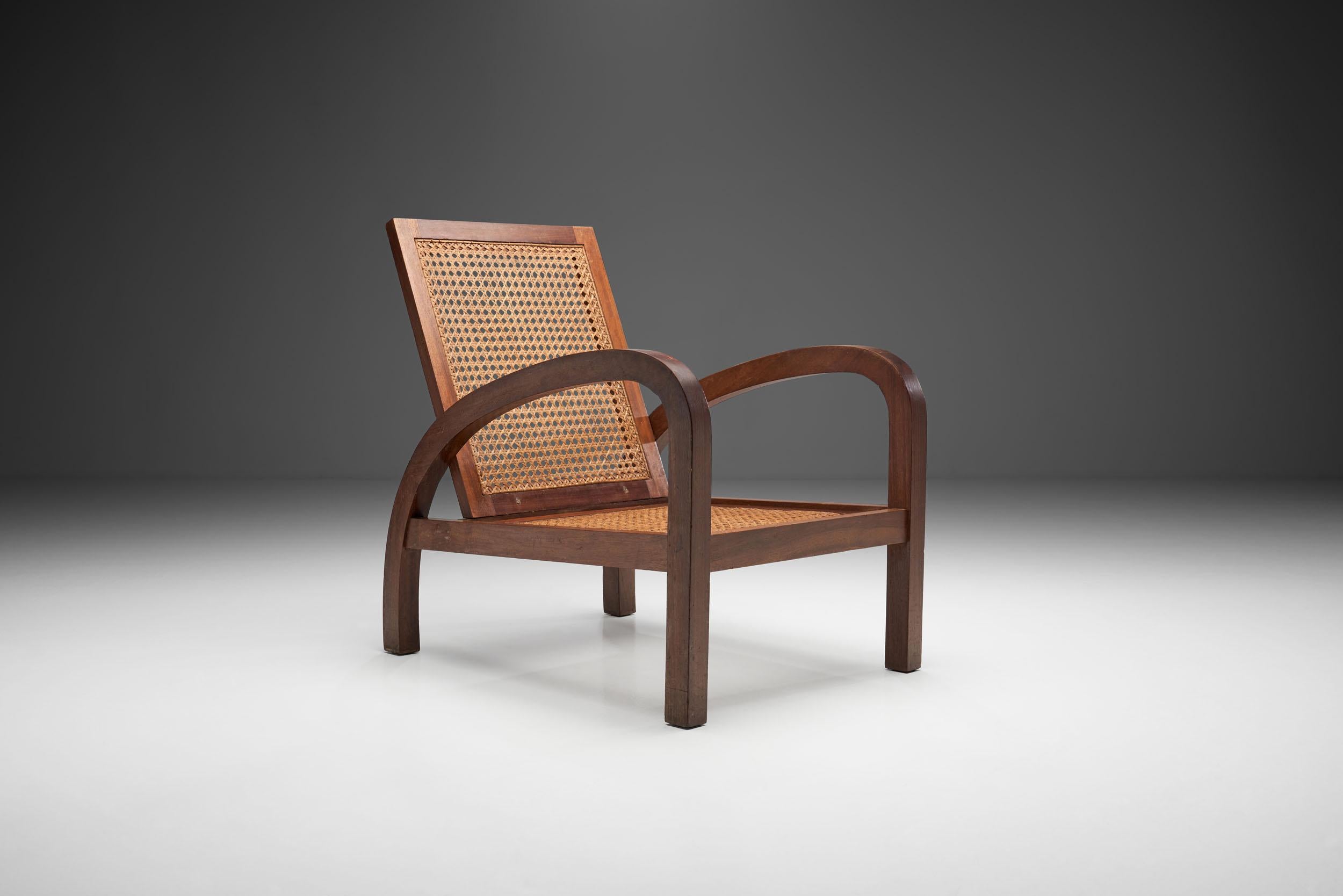 This “boat or cruise chair” (fauteuils de paquebot in French) are not only visually arresting, but also interesting thanks to their historical use.

The chair is made of exotic wood and were used as deck chairs on boats around the mid-century. As