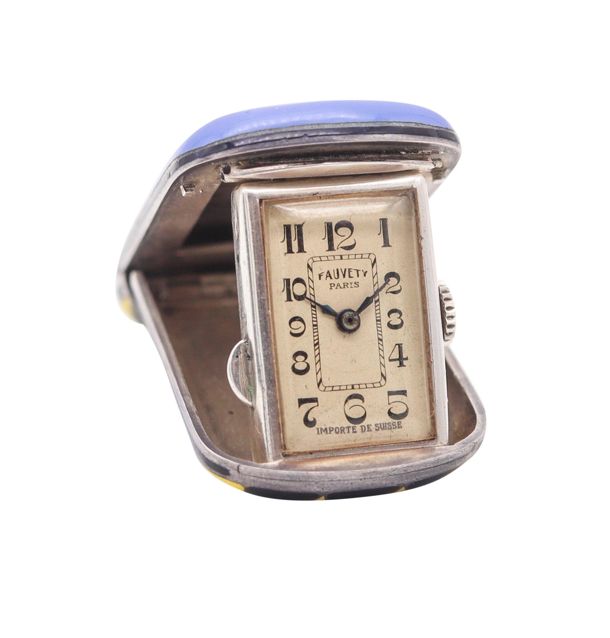 A travel-purse watch designed by Fauvety Paris.

This is a beautiful colorful travel-purse watch created during the art deco period in Paris France, back in the 1925. This pocket-purse watch has been designed by Fauvety-Paris and is highly