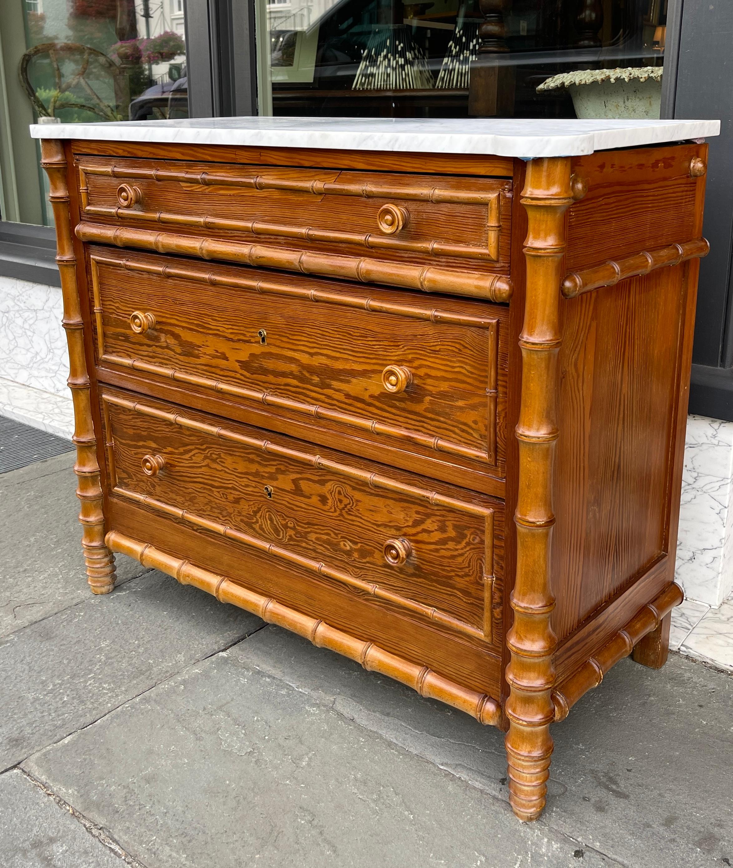 Faux bamboo French pine chest with white marble top