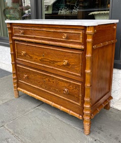 Faux bamboo 3 drawer chest with marble top