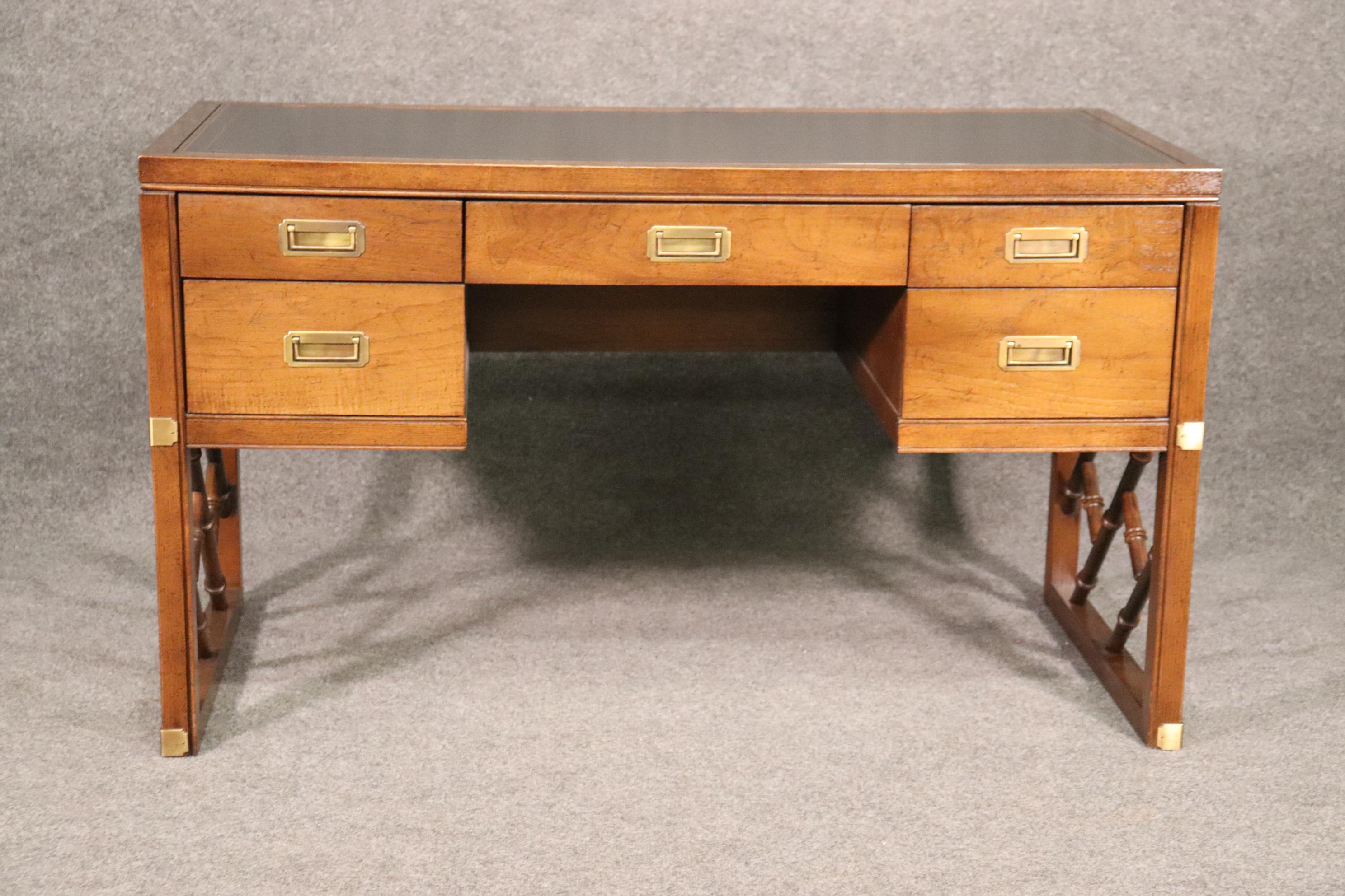 This is a beautiful desk in good condition. The desk is 50 inches wide x 24 inches deep x 29 tall. The desk has a little bit of scratches to the leather top.
